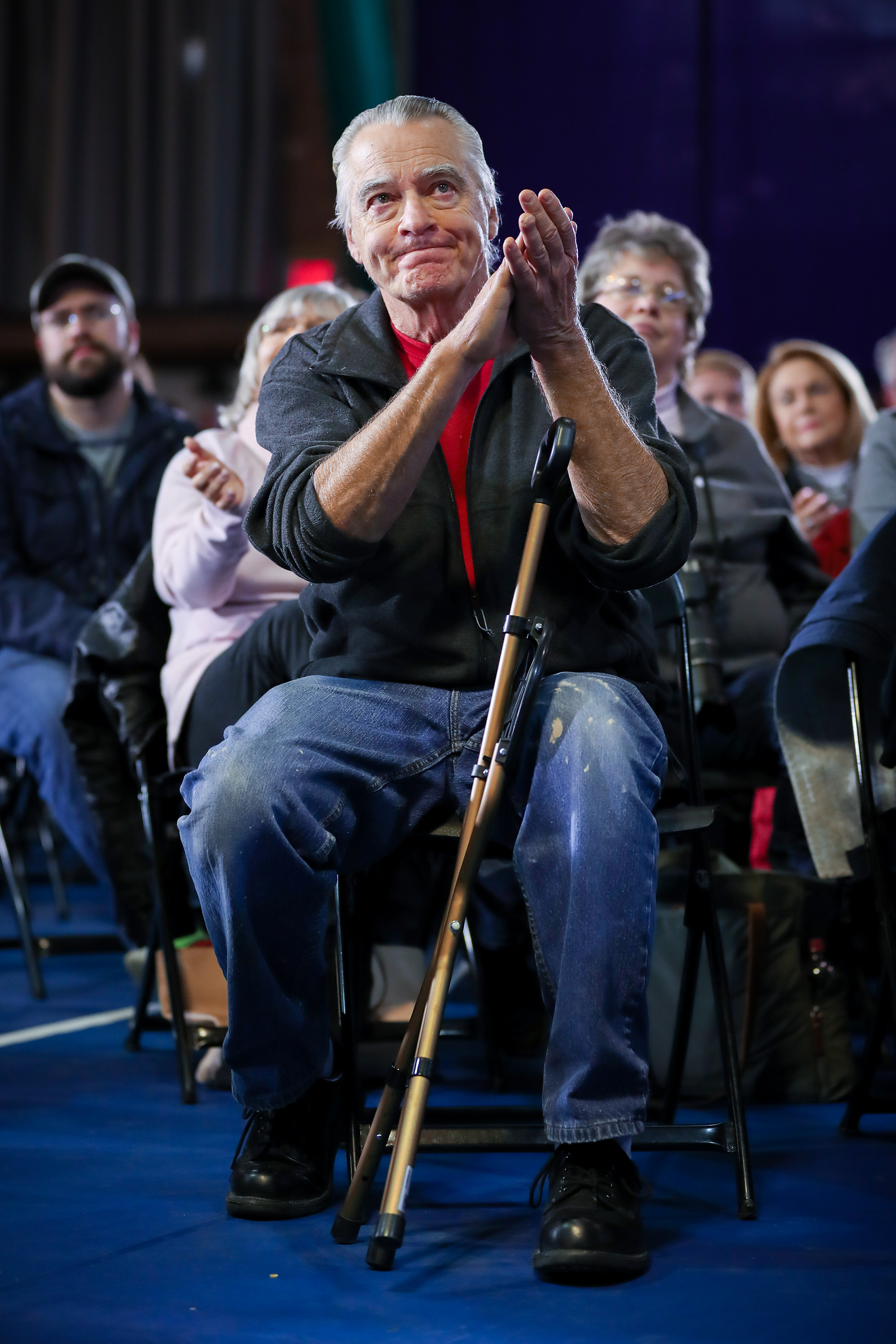 An elderly supporter claps in support of Senator Elizabeth Warren during a town hall event on October 22, 2019 at the University of Northern Iowa in Cedar Falls, Iowa.