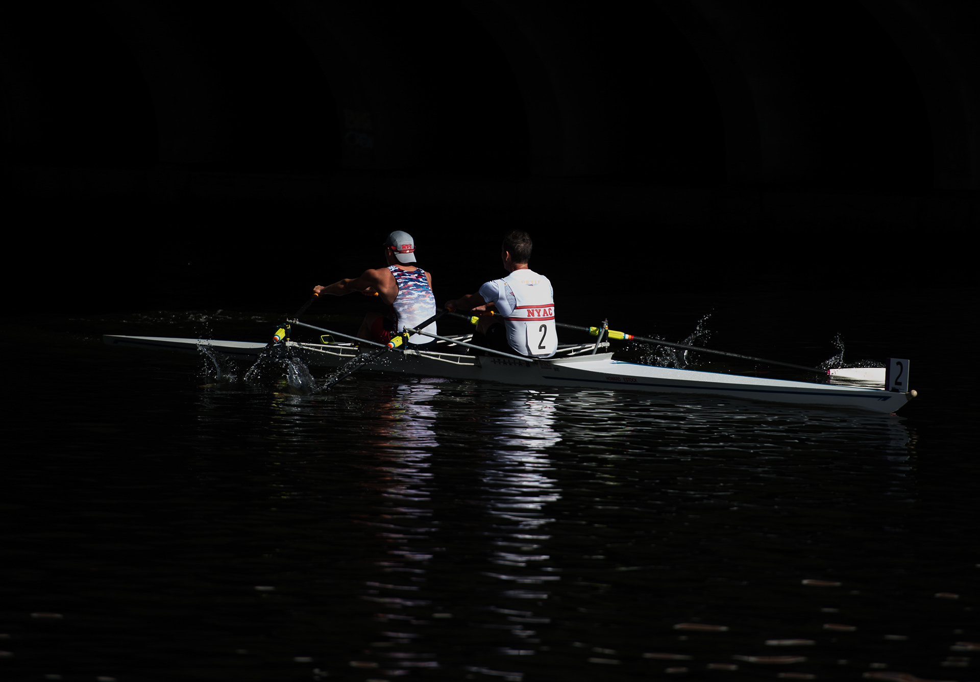 Two rowers compete in the Men's Master Doubles at the 53rd Head of the Charles Regatta in Cambridge, Massachusetts on October 22, 2017.