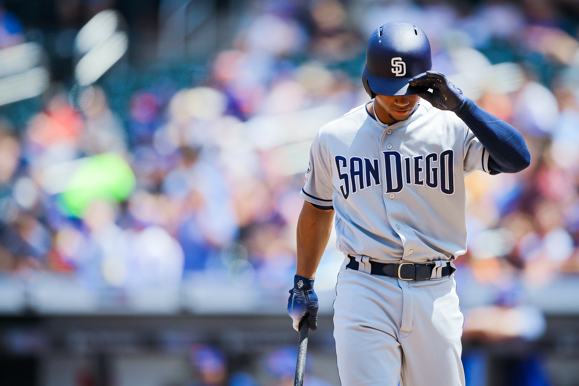 Francisco Mejia #27 of the San Diego Padres returns to the dugout after striking out at Citi Field on July 25, 2019 in Flushing, New York.