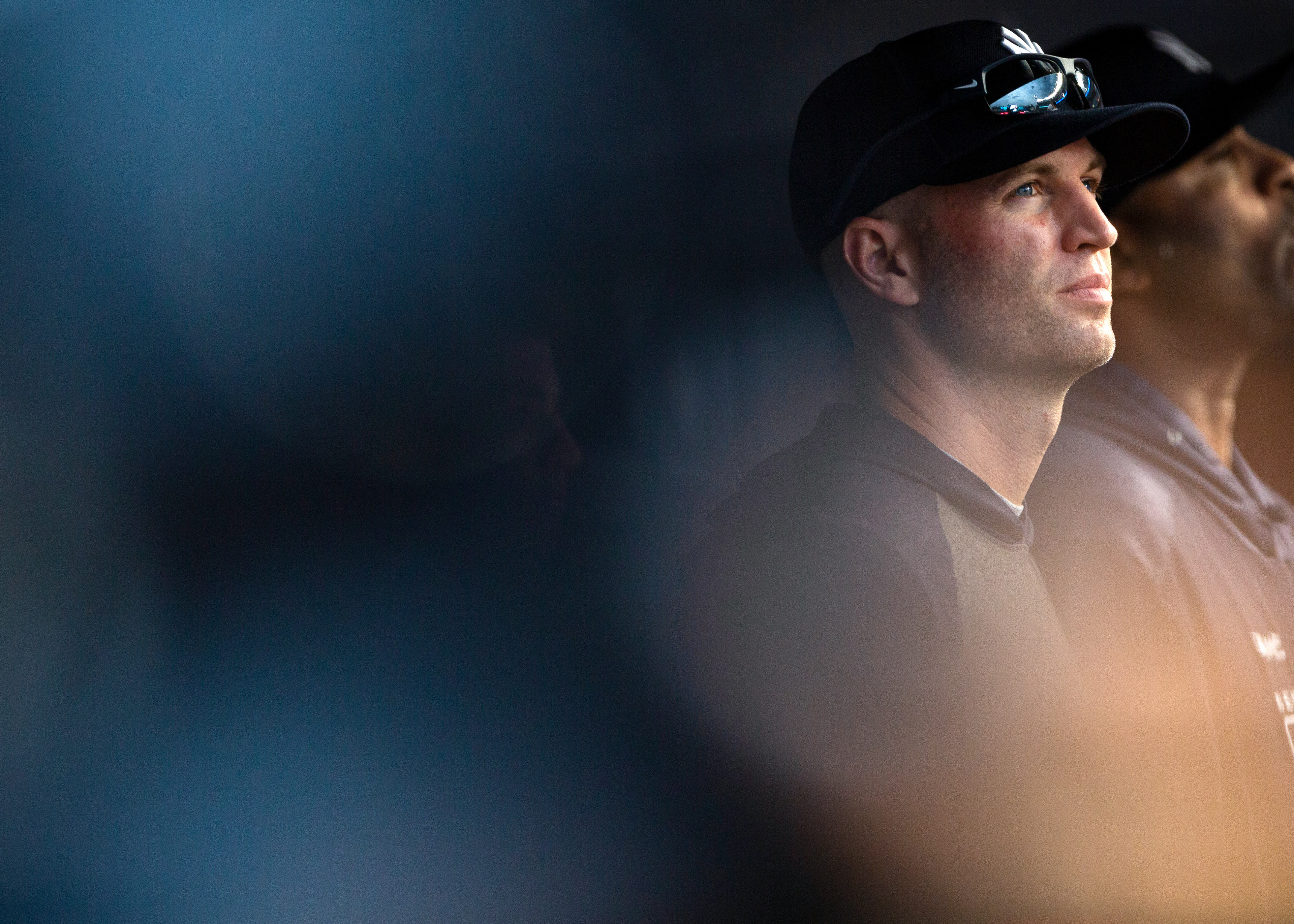 J.A. Happ #33 of the New York Yankees looks on from the dugout during a game between the Arizona Diamondbacks and the New York Yankees at Yankee Stadium on Wednesday, July 31, 2019 in the Bronx borough of New York City.