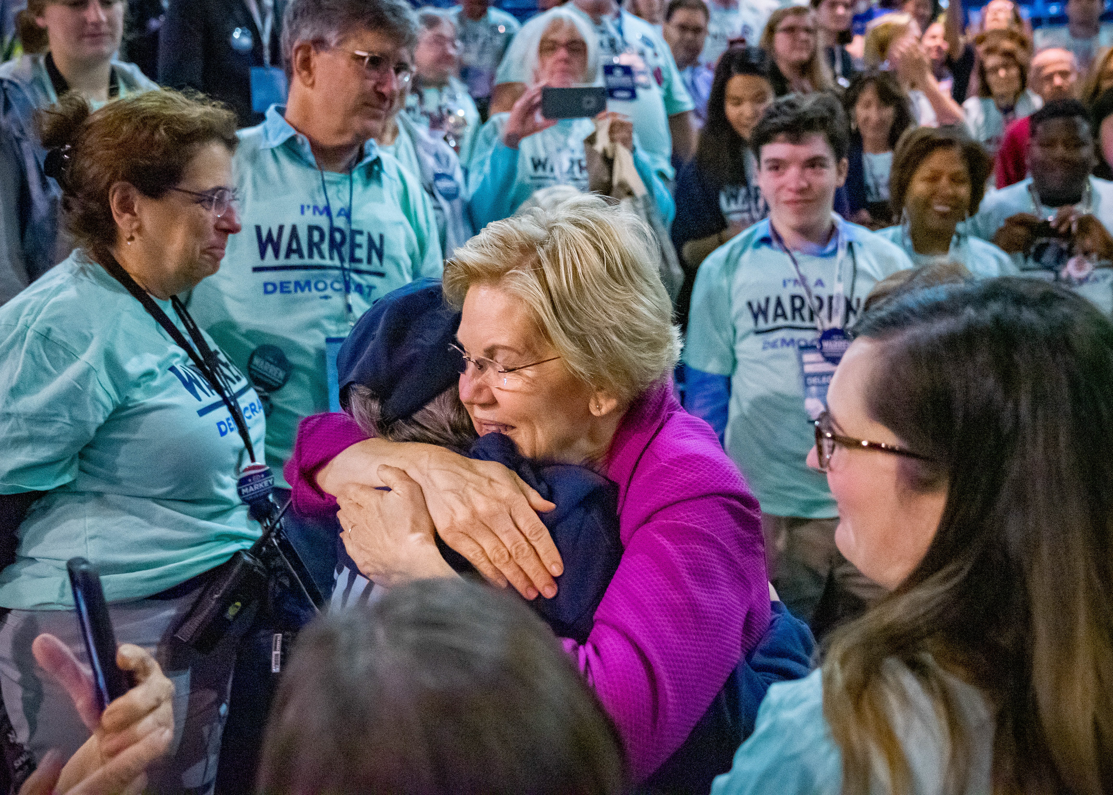 Senator Elizabeth Warren embraces a local volunteer during the Massachusetts Democratic Convention held at the Mass Mutual Center on September 14, 2019 in Springfield, Massachusetts.