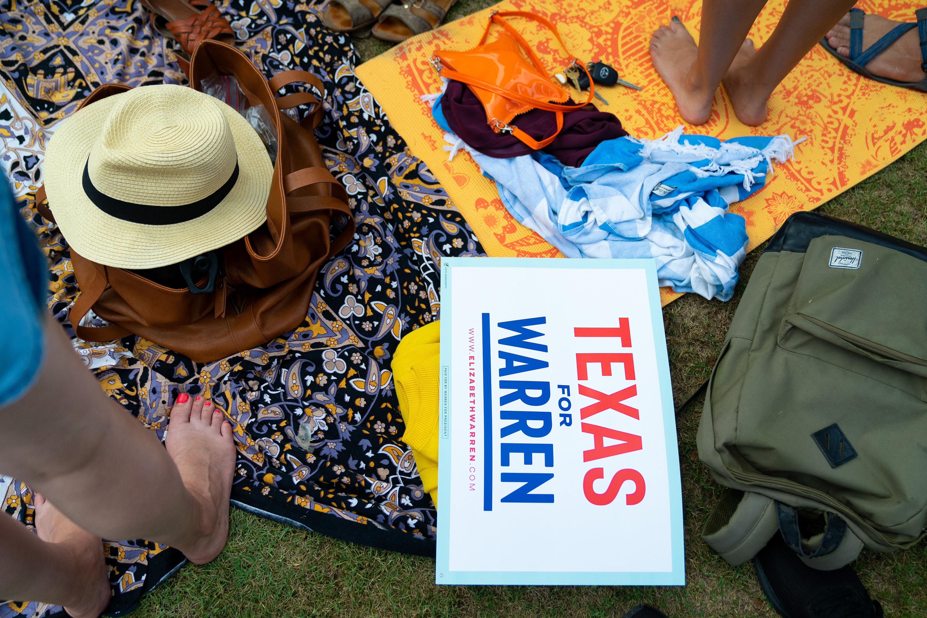 Attendees bring blankets, sunhats, and signs of support to an Elizabeth Warren for President 2020 town hall event on September 10, 2019 at Auditorium Shores in Austin, Texas.