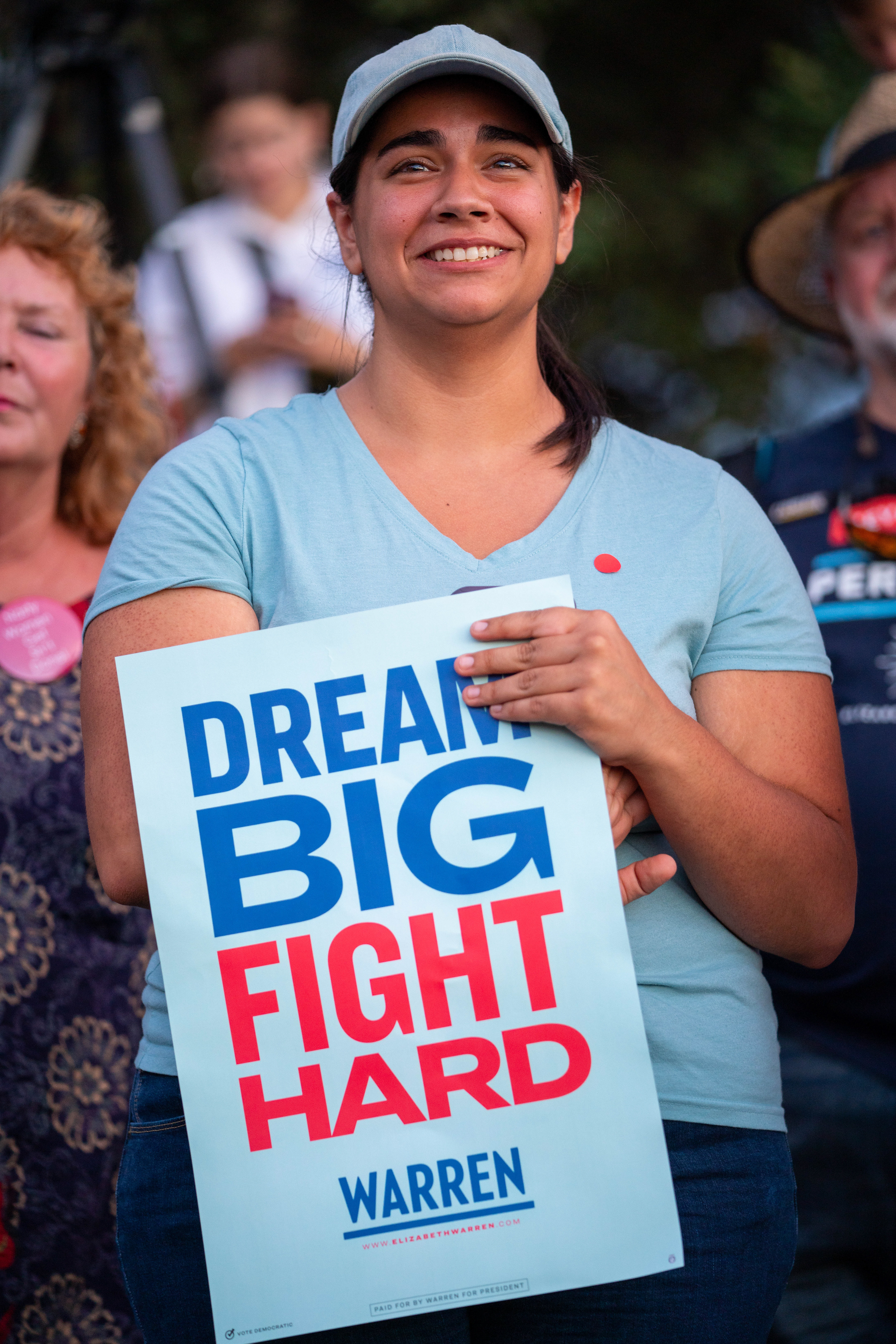 A young working single mother tears up as Senator Elizabeth Warren responds to her question about aid for low-income working families during a town hall event on September 10, 2019 at Auditorium Shores in Austin, Texas.