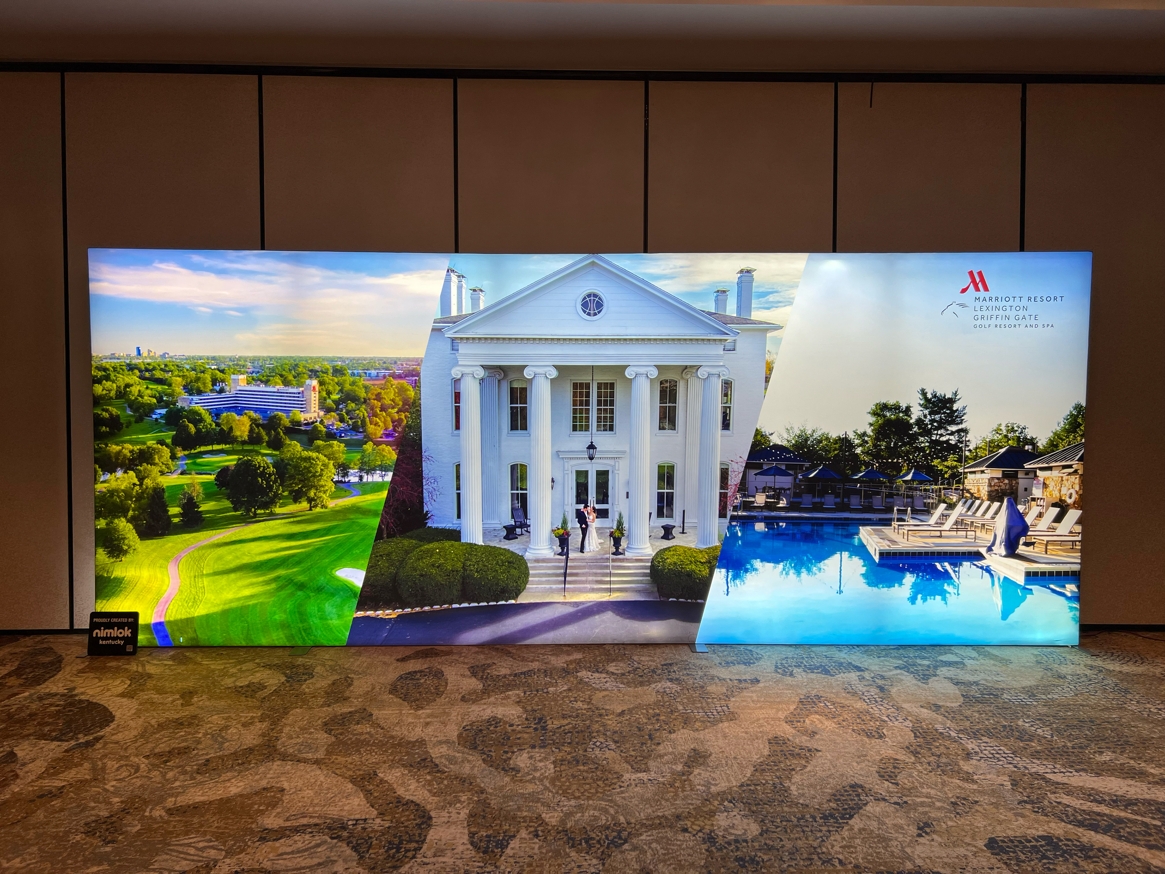 15' Backlit Backwall Showcasing the Hosting Hotel