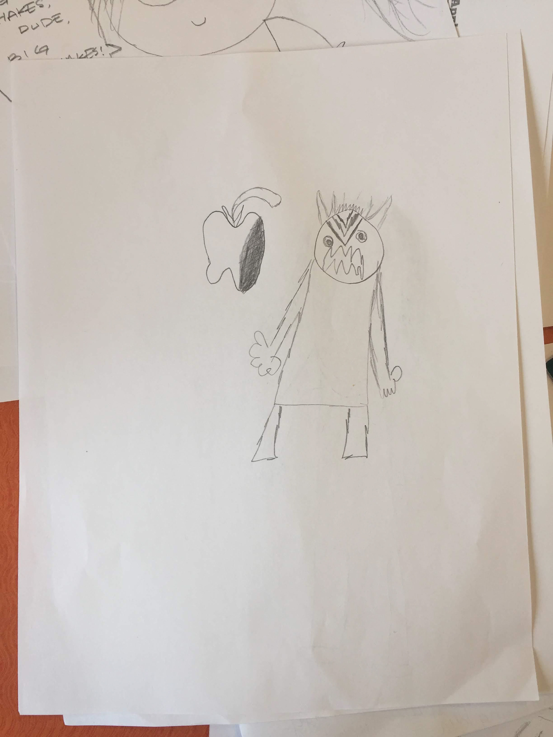 A resident's drawing of a monster with an apple.