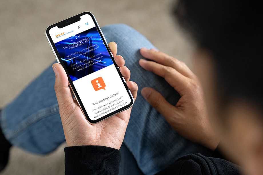 Man hold a smart phone white screen view from top