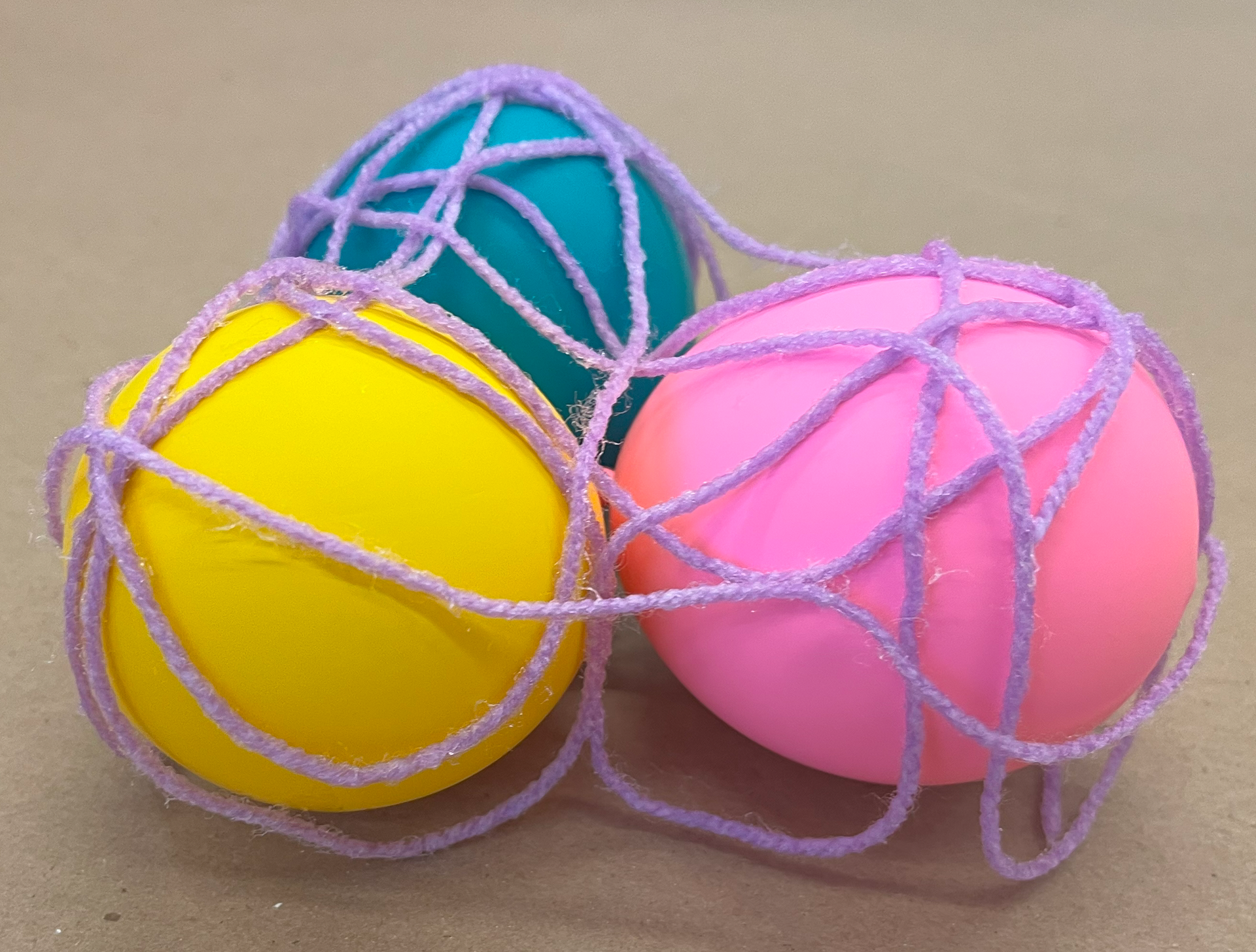 Designing structure with yarn draped over balloon