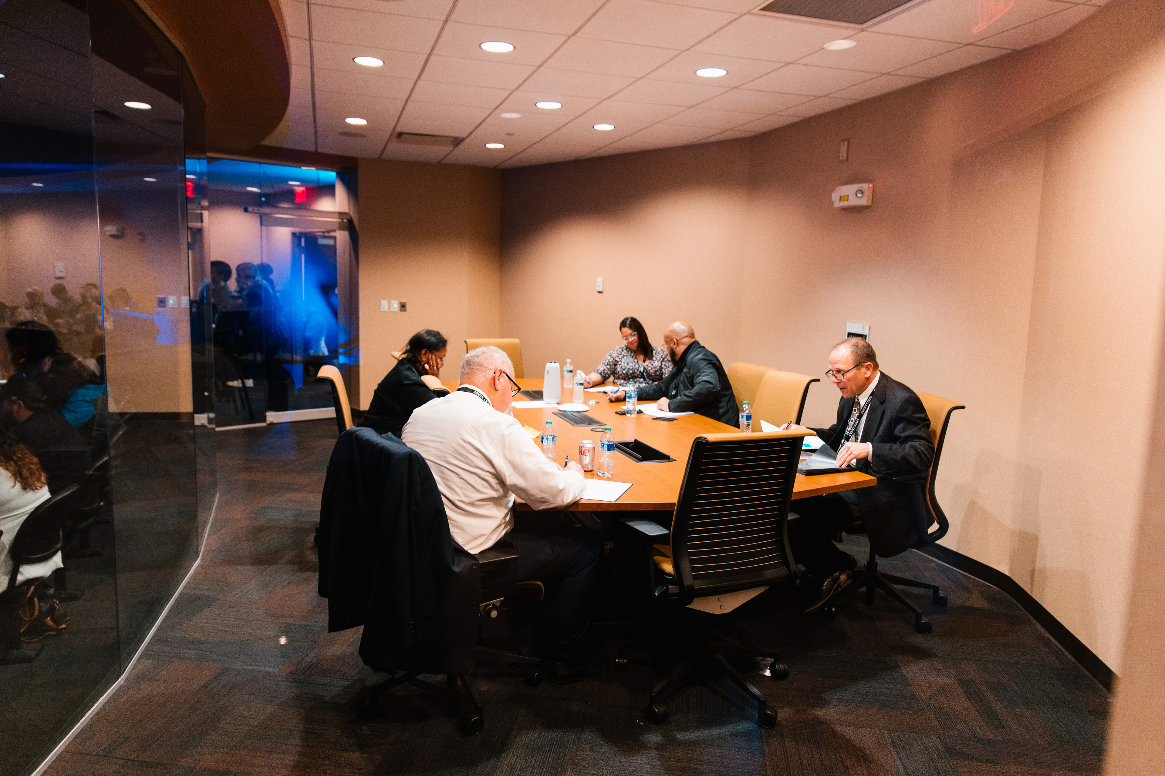 The judges conference before announcing a winner