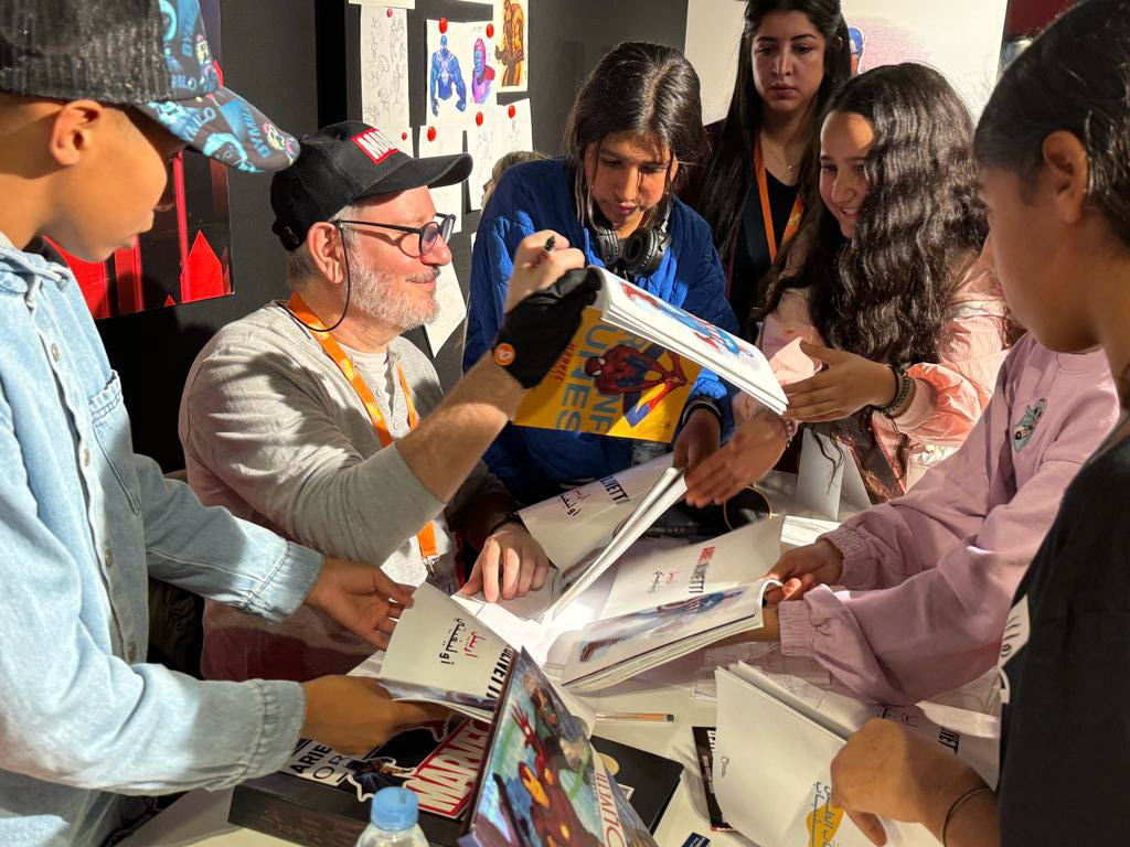 Ariel Olivetti had a great time signing books for the fans.