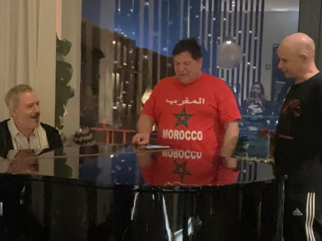 Ariel Olivetti plays and sings a beautiful version of PIANO MAN, while Darren and Buddy join in.