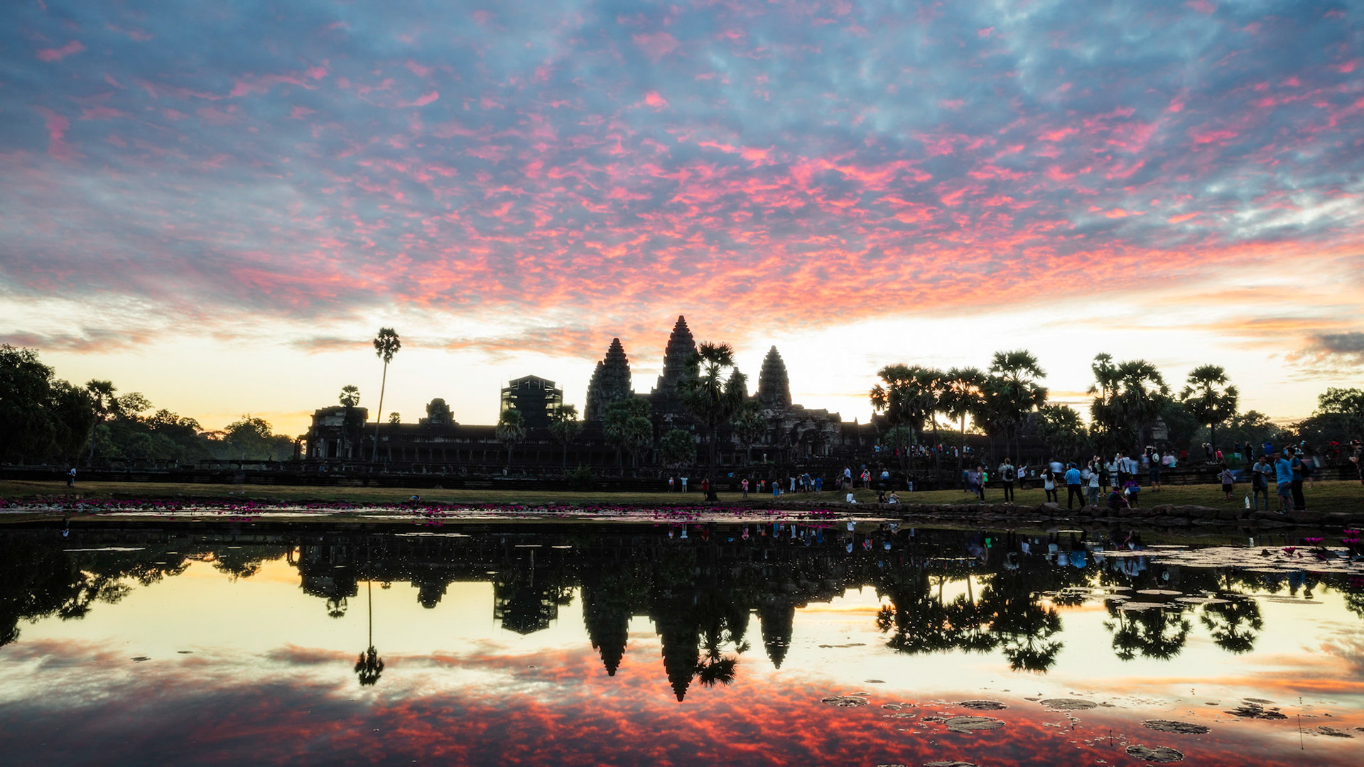 Sky turning color as the sun starts to rise over Angkor Wat