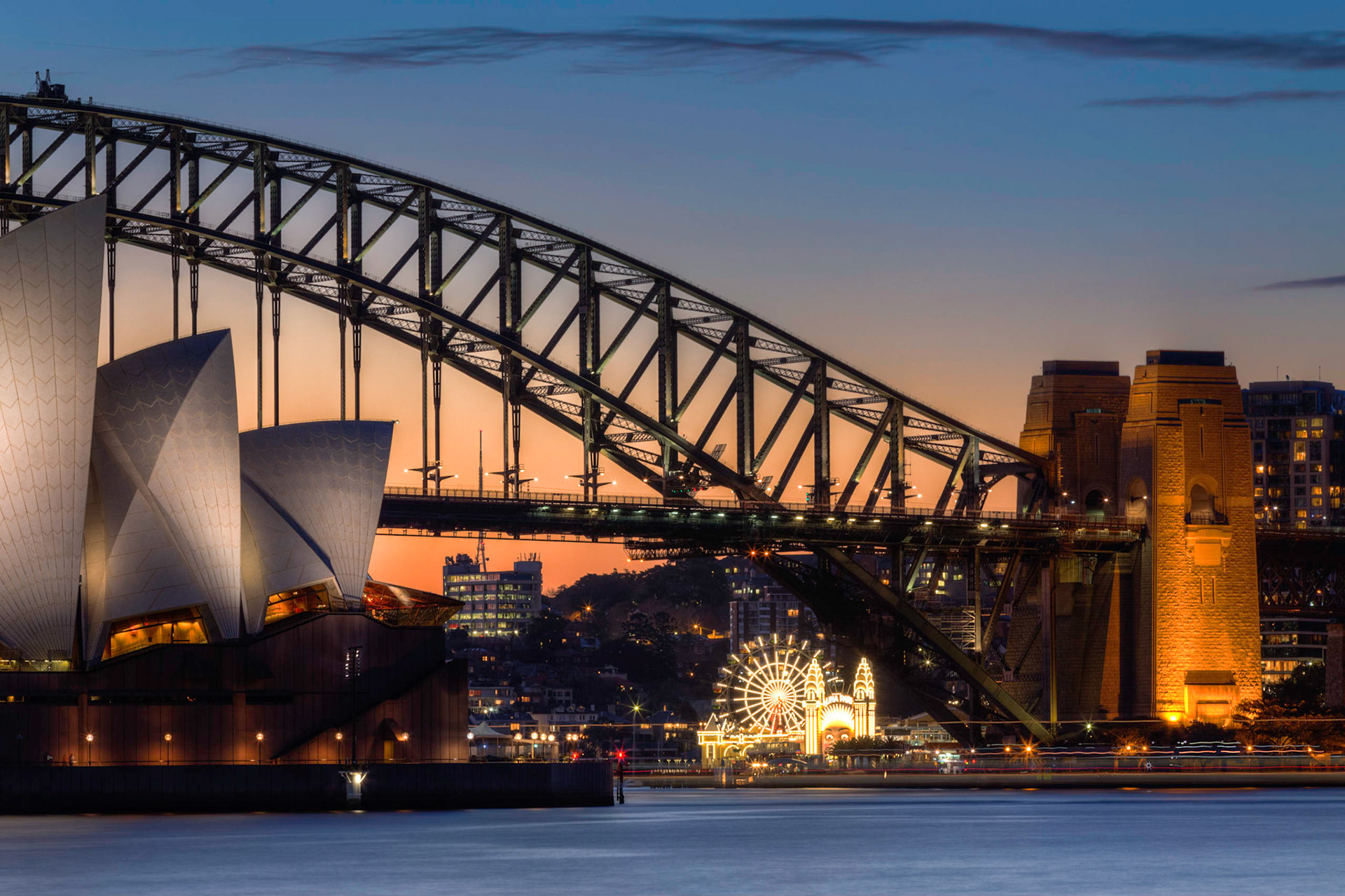 Look at Luna Park Under the Harbor Bridge with the Opera House off to the left.