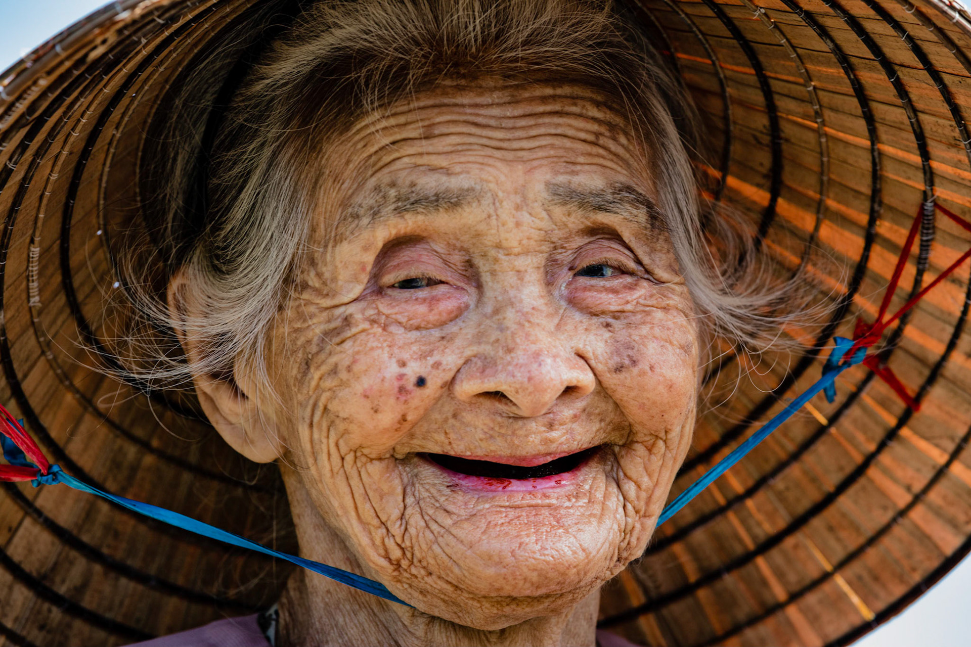An elderly woman from a herb farm in the countryside near Hoi An, Vietnam.