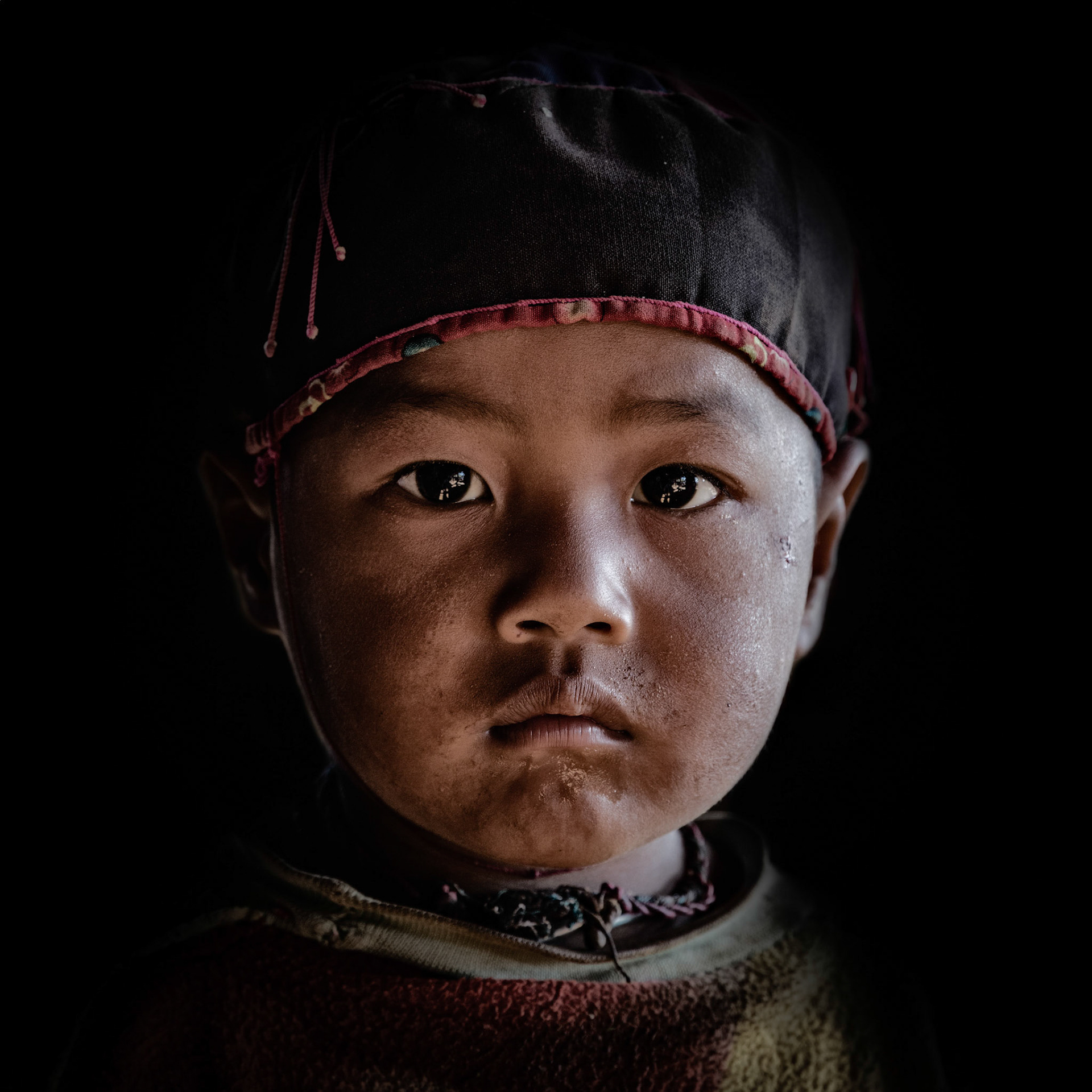 One of the young boys of the Ann tribe near Kengtung, Myanmar.