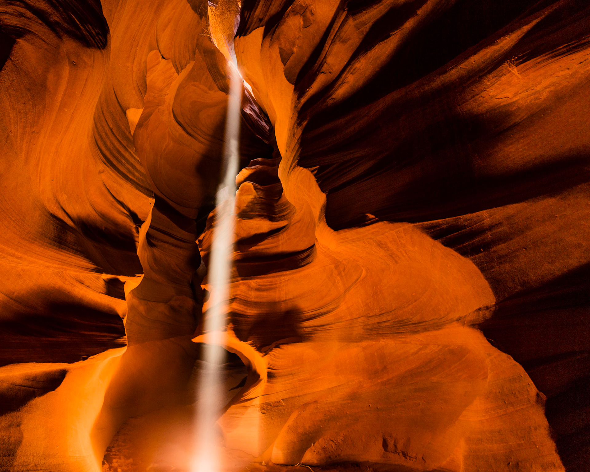The midday sun beaming into the canyon light up the walls
