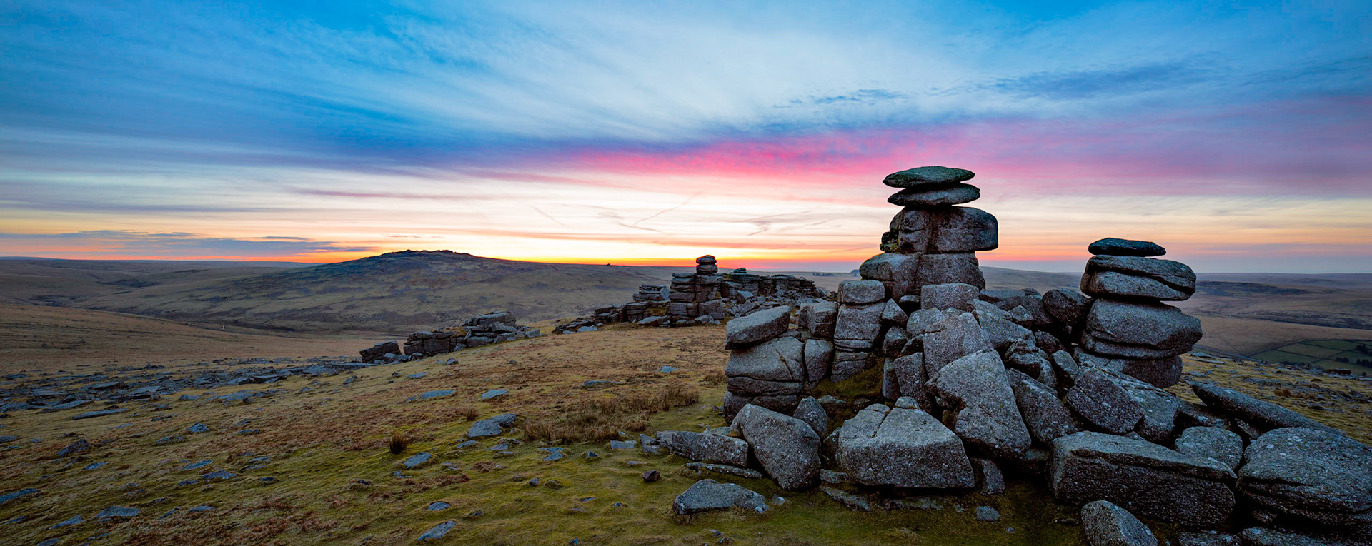 Early morning just before dawn on a late winter morning in Dartmoor National Park. This picture is a combination of 3 images taken with a 24 mm tilt shift lens, shifting the lens to capture each image. After merging the pano, only basic level adjustments within lightroom were made to produce the final photo.