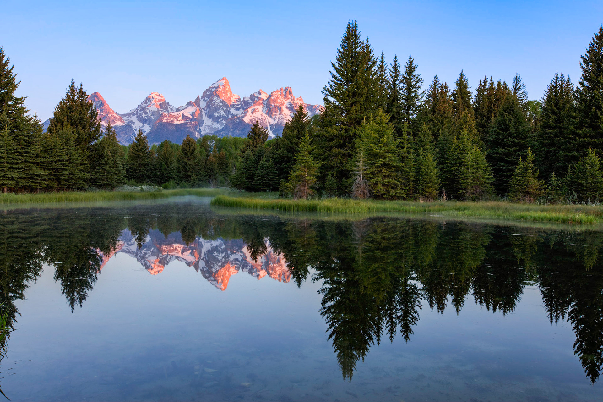 An early still morning on Jenney Lake out in the Grand Tetons