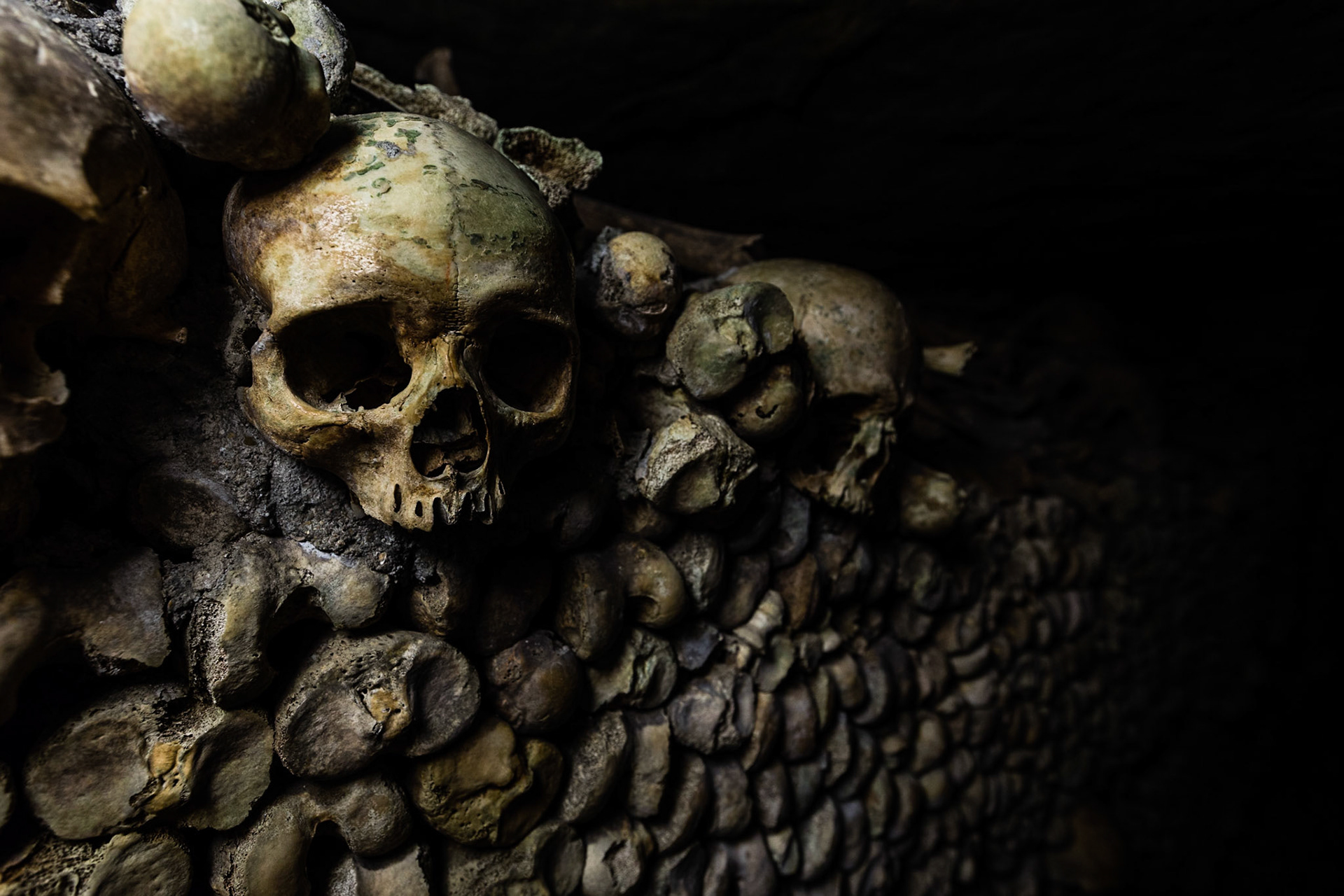 Second visit to the catacombs of Paris with better equipment to help me capture the bones in low light.