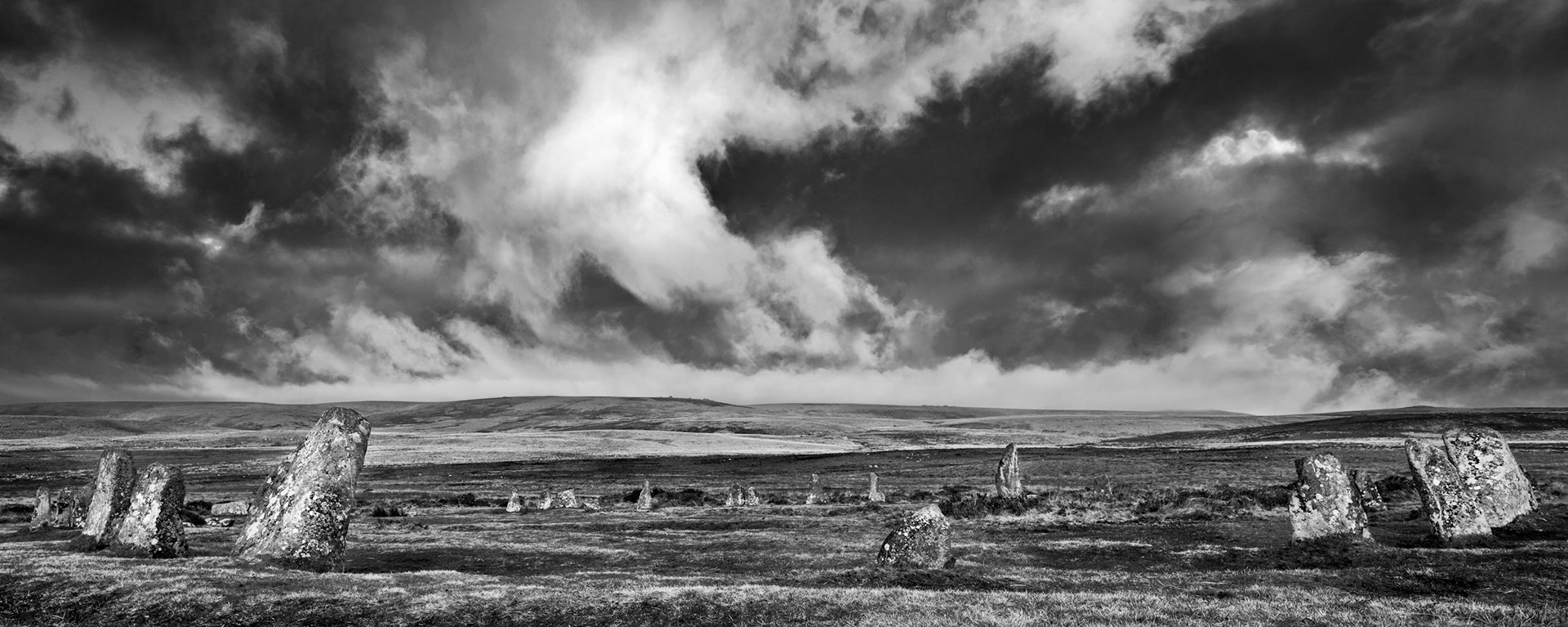 Scorhill stone circle with a moody sky in Dartmoor National Park near Frenchbeer.