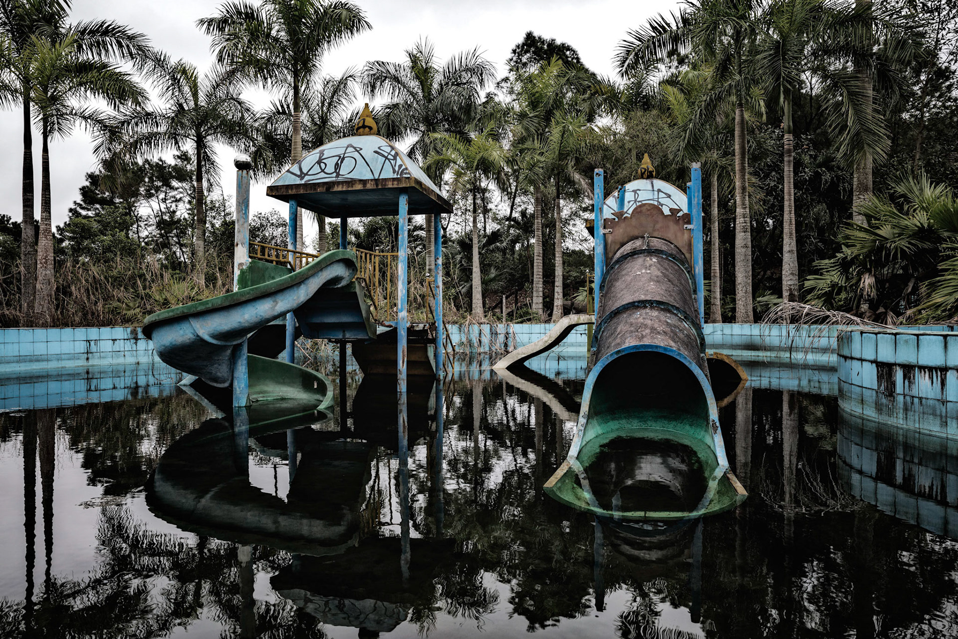 Waterslides at an abandoned water park in Hue, Vietnam