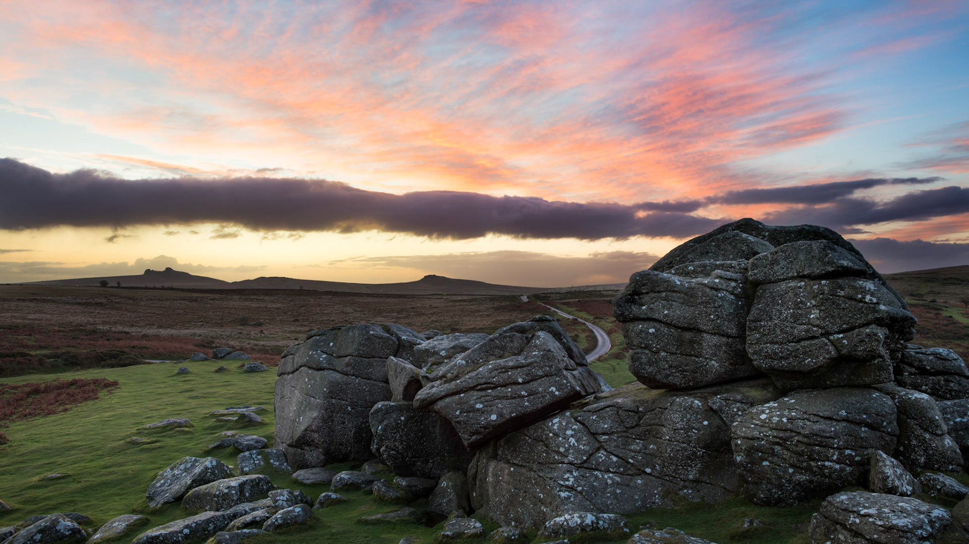 Sunrise from Bonehill rocks above Widecombe in the Moor looking towards Haytor and Rippon Tor