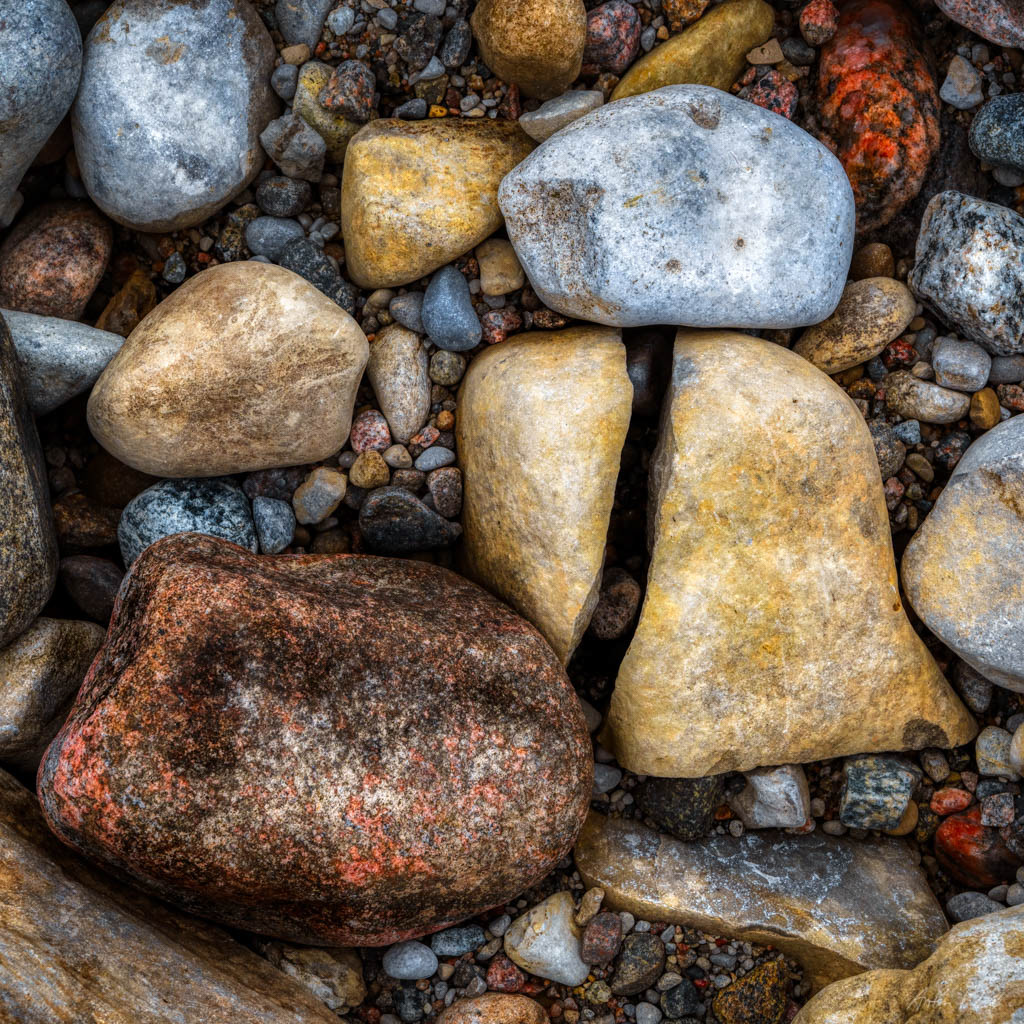 overhead photo of rocks - one is split