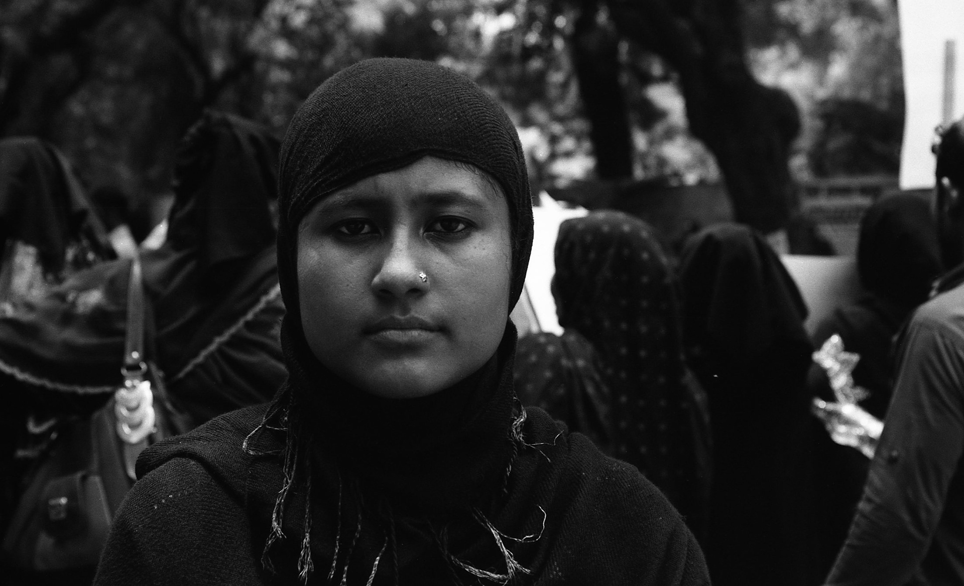 A young woman at a protest by Rohingya refugees, New Delhi 2014.