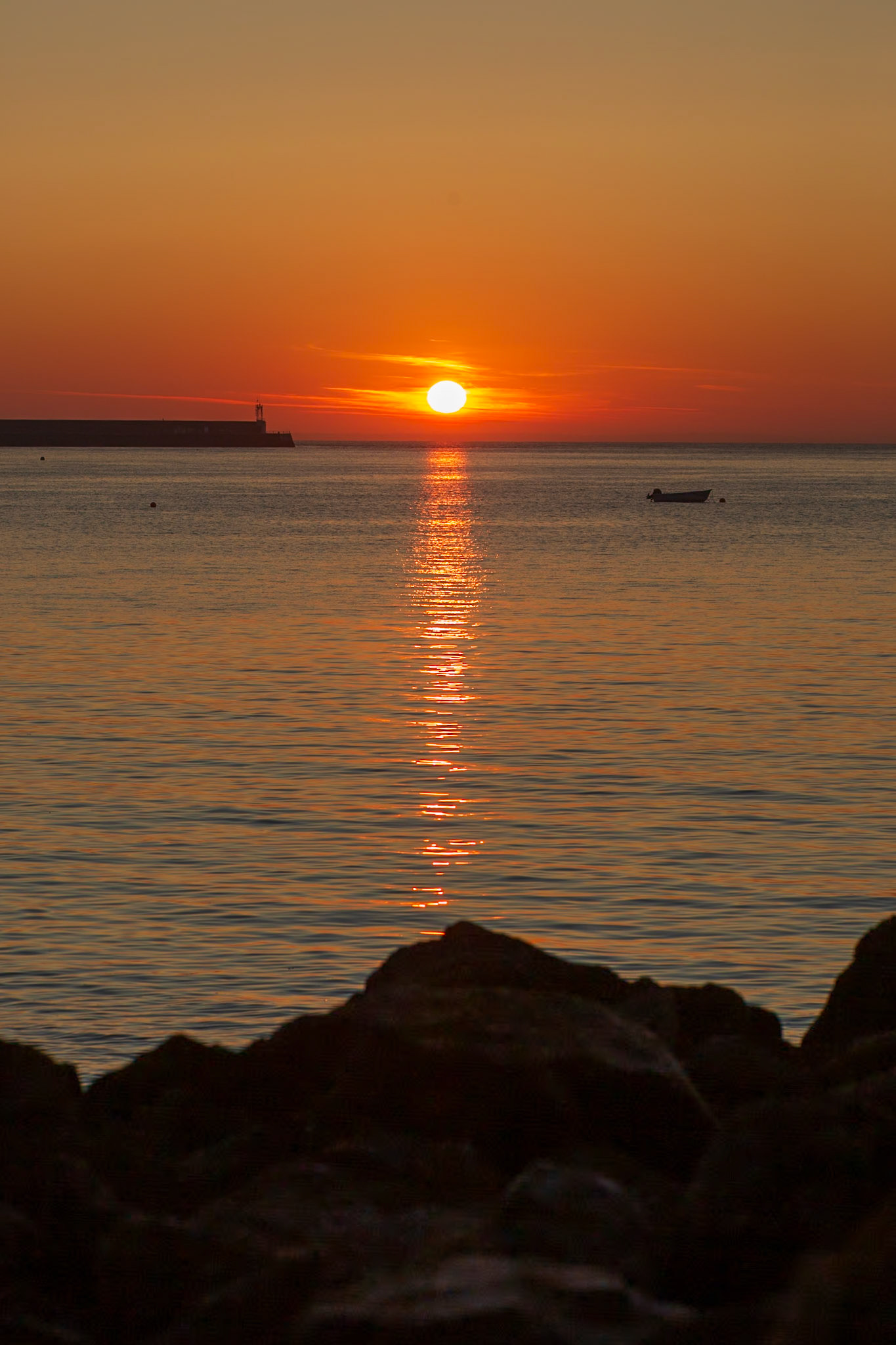 Sunrise over distant Normandy without zoom.