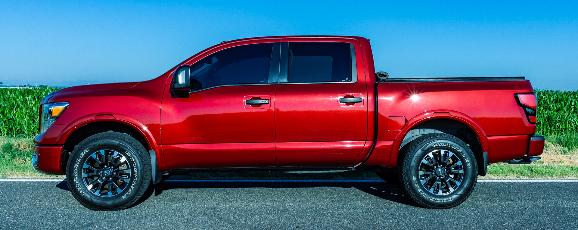 And the obligatory summer photo shoot of my baby.  Badge delete, midnight edition taillight upgrade and removed the running boards.  Karla is clean.  The envy of the local Titan community.  Drink her in. Always goes down smooth.