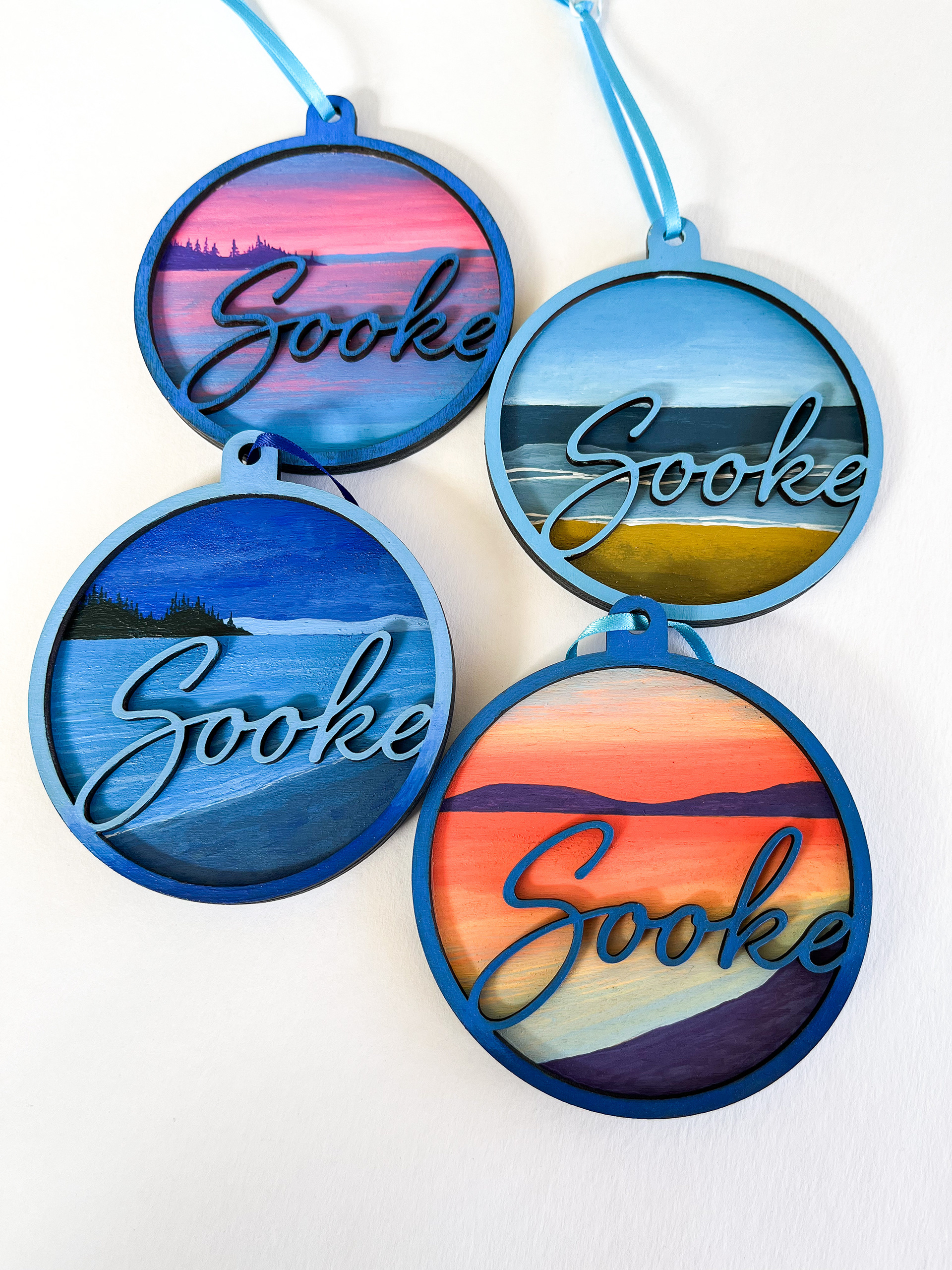 Hand-painted with my original design. Laser-cut ornaments