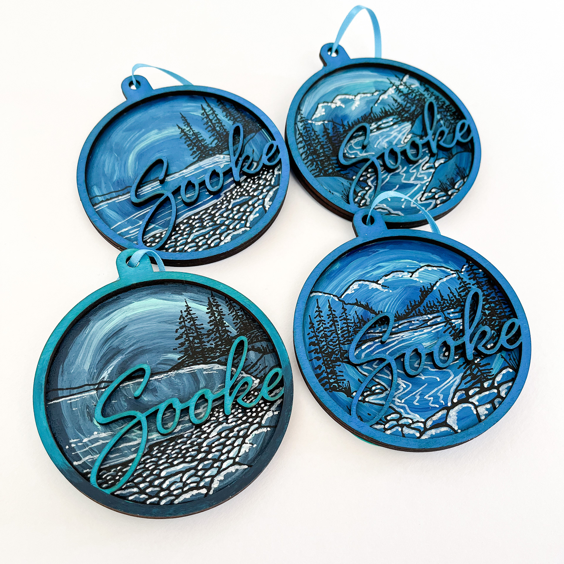 Hand-painted with my original design. Laser-cut ornaments