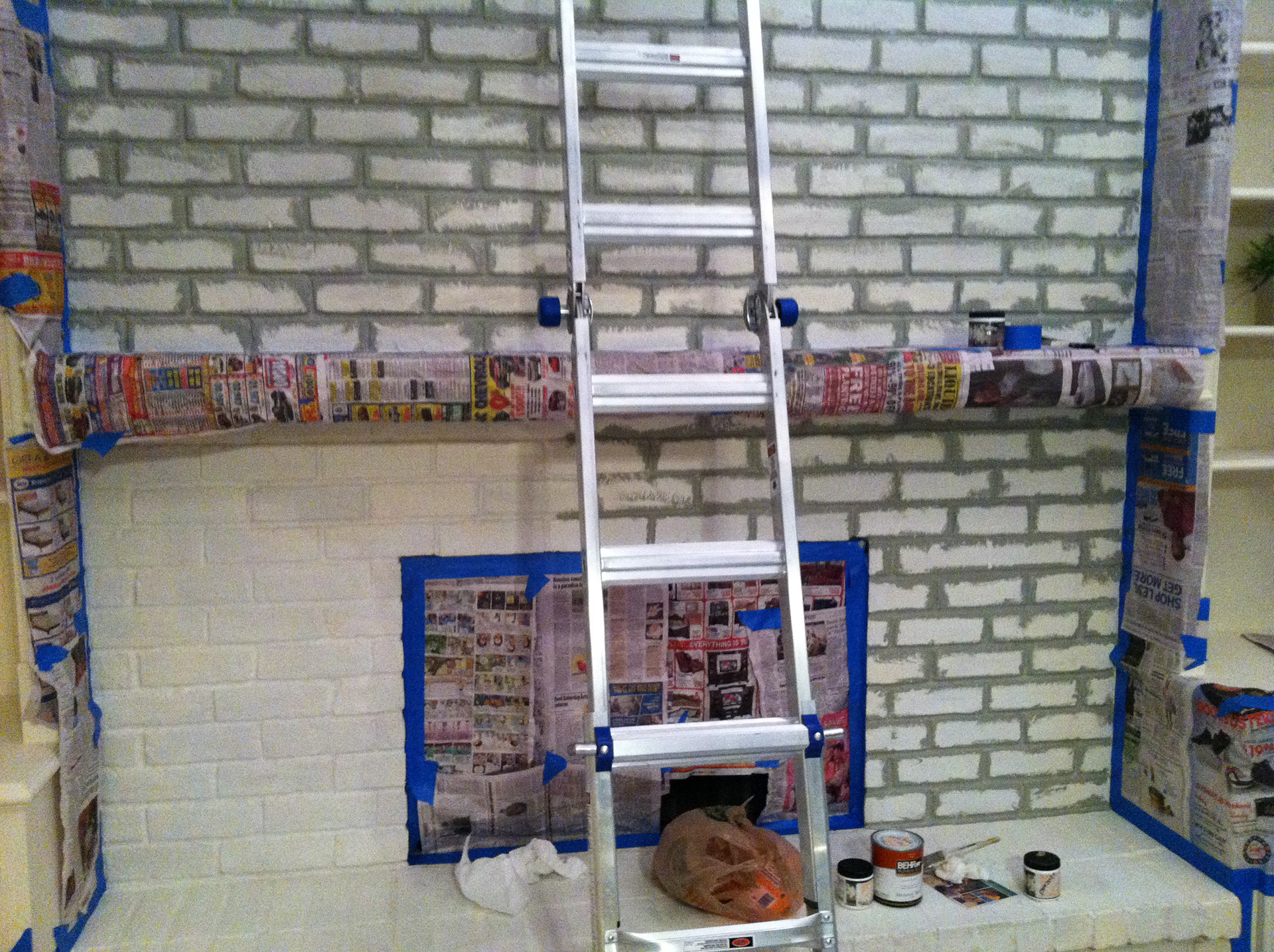 First, I painted the "grout" to a gray color before starting on the warm brown colors for the bricks.