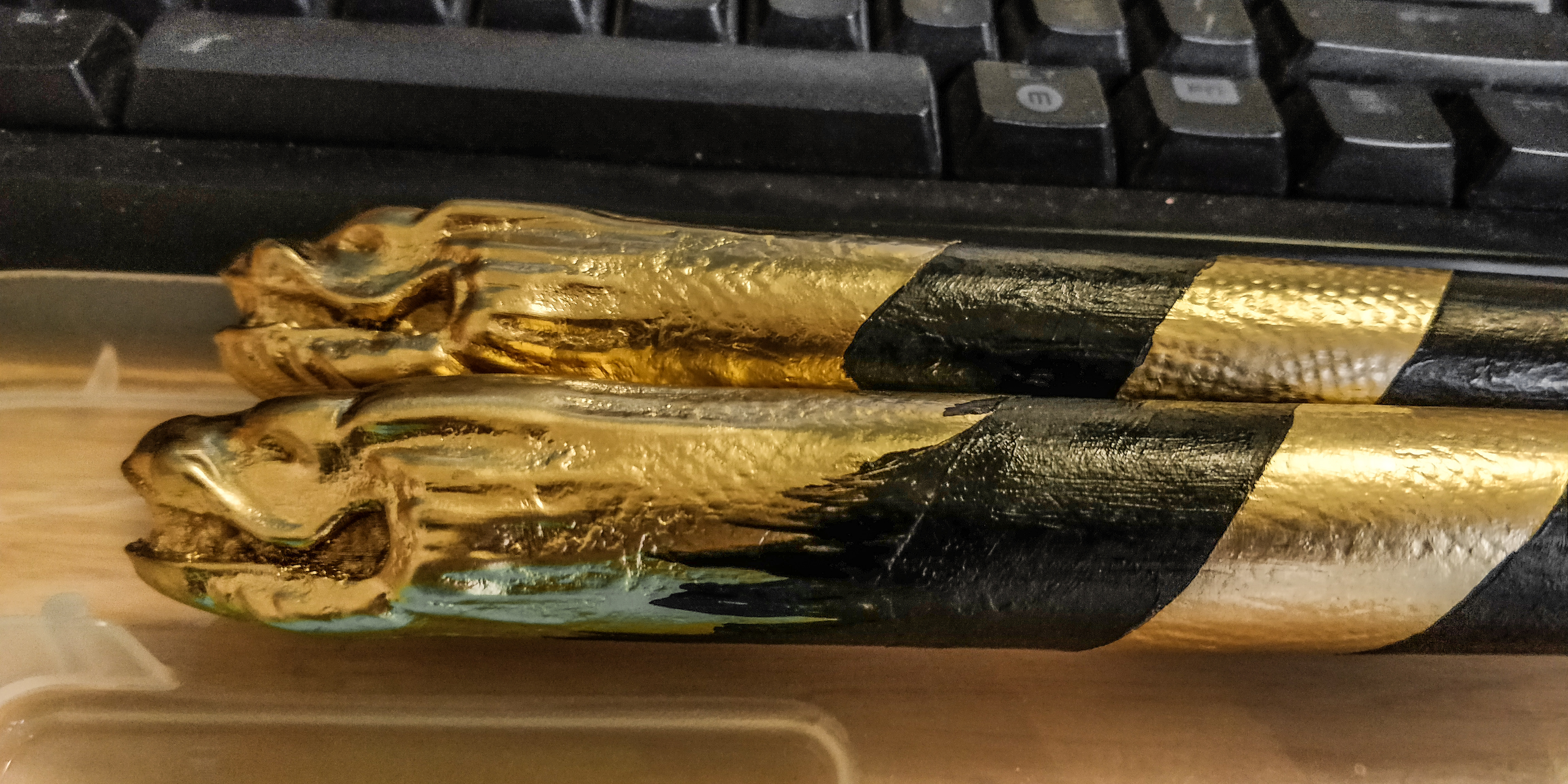 Nunchucks painted with black acrylic paint.