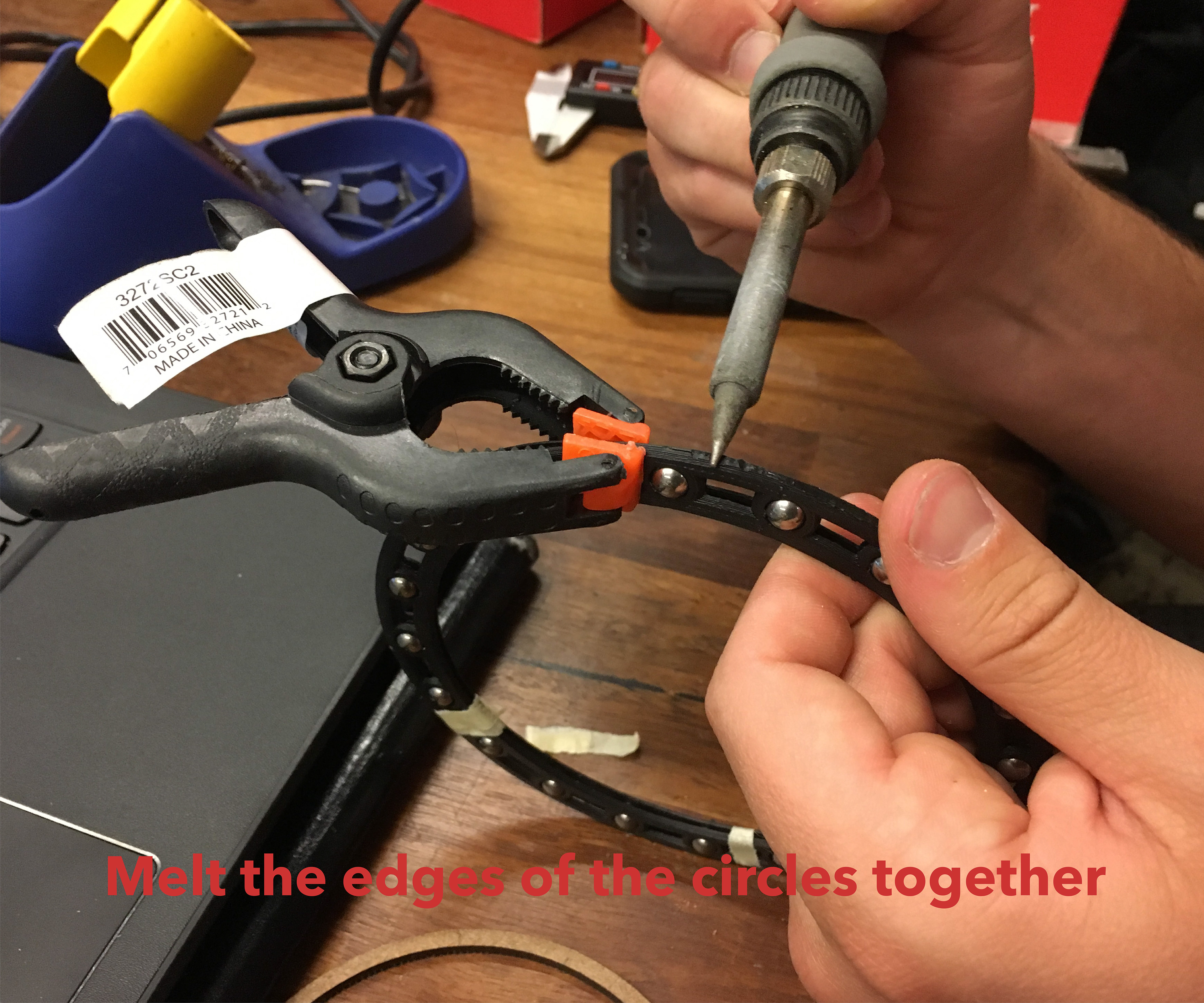 Assembling the 3D-printed ball bearings.