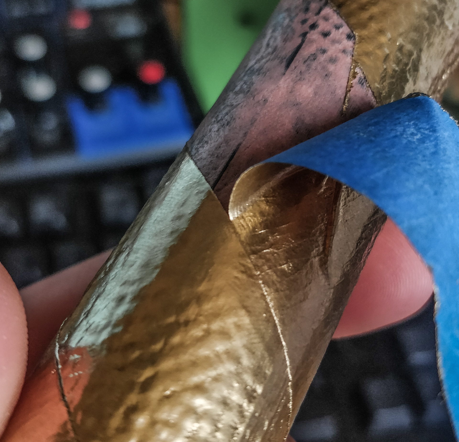 Peeling off the masking tape.
