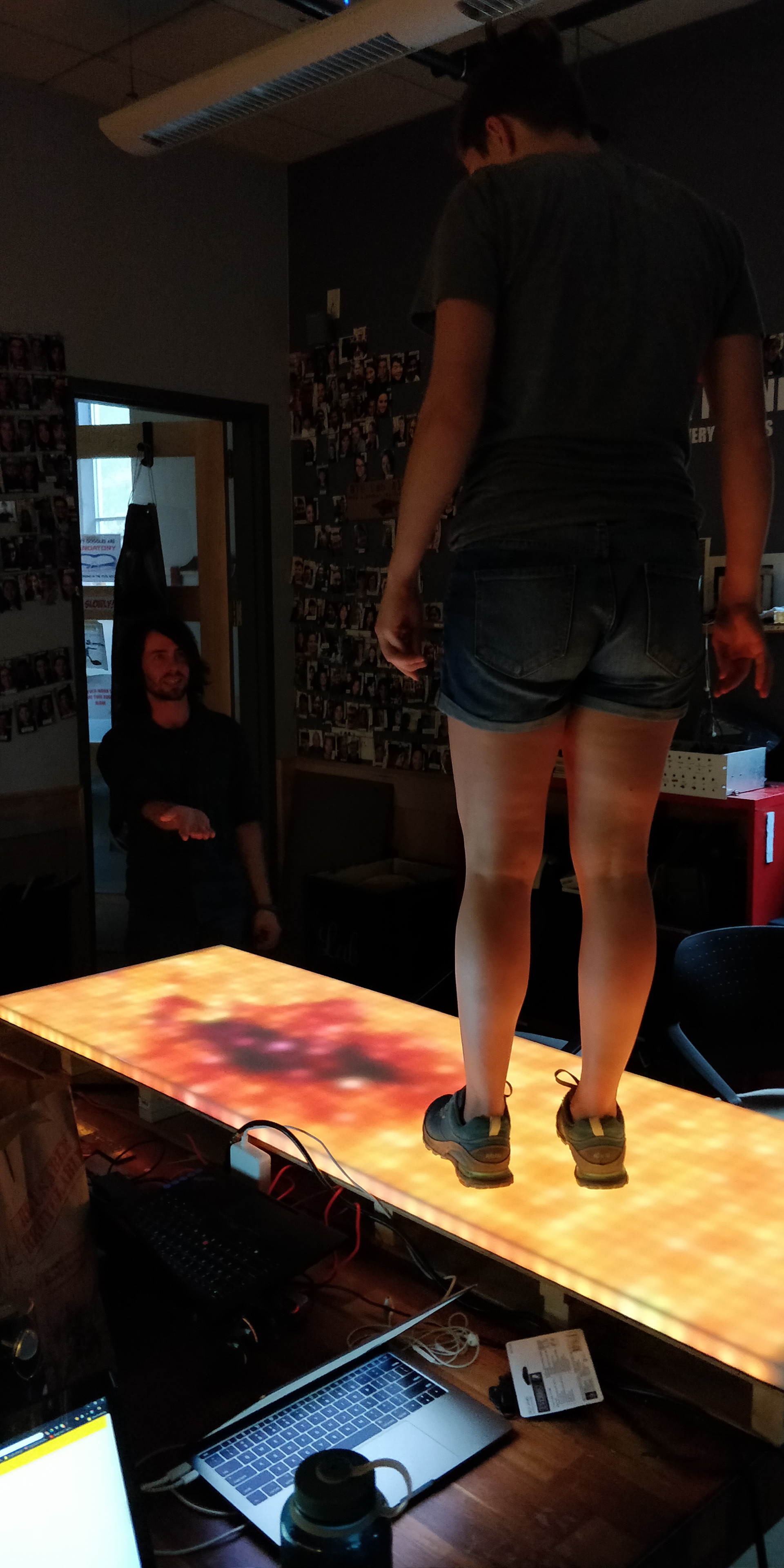 Standing on a floor panel.