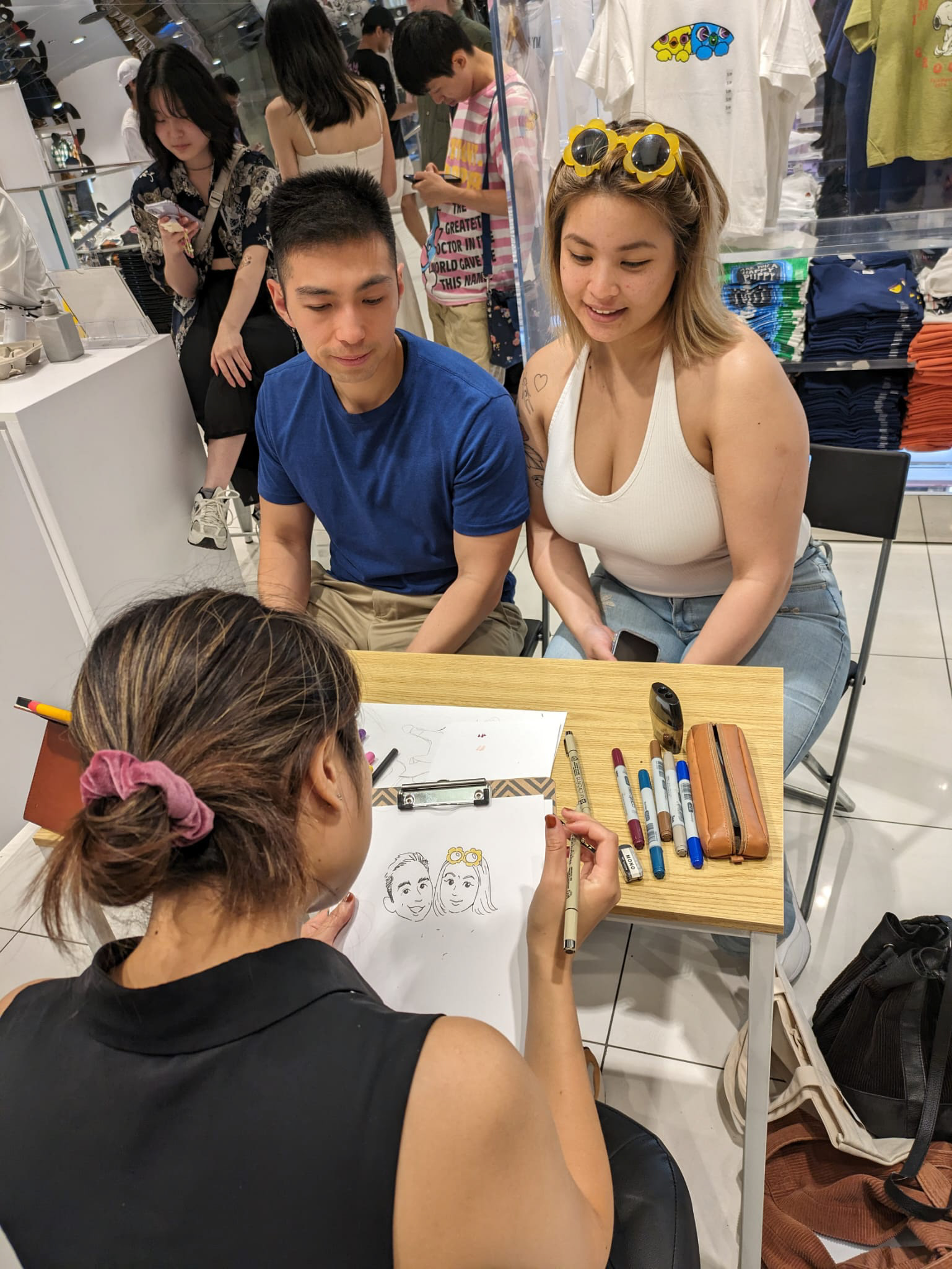 Toronto Eaton Centre Uniqlo live drawing event