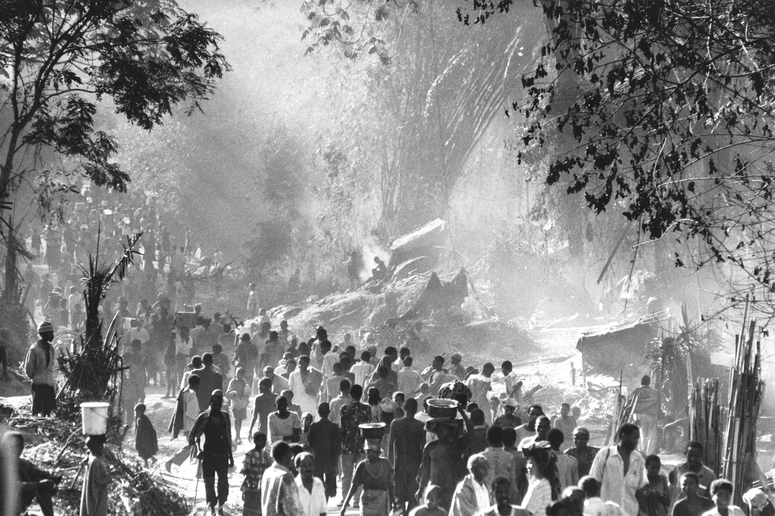 80,000 Hutu refugees trek trough jungle near Kisangani. Hutu refugees fled fighting in their camps near the Rwandan border in late 1996 and early 1997