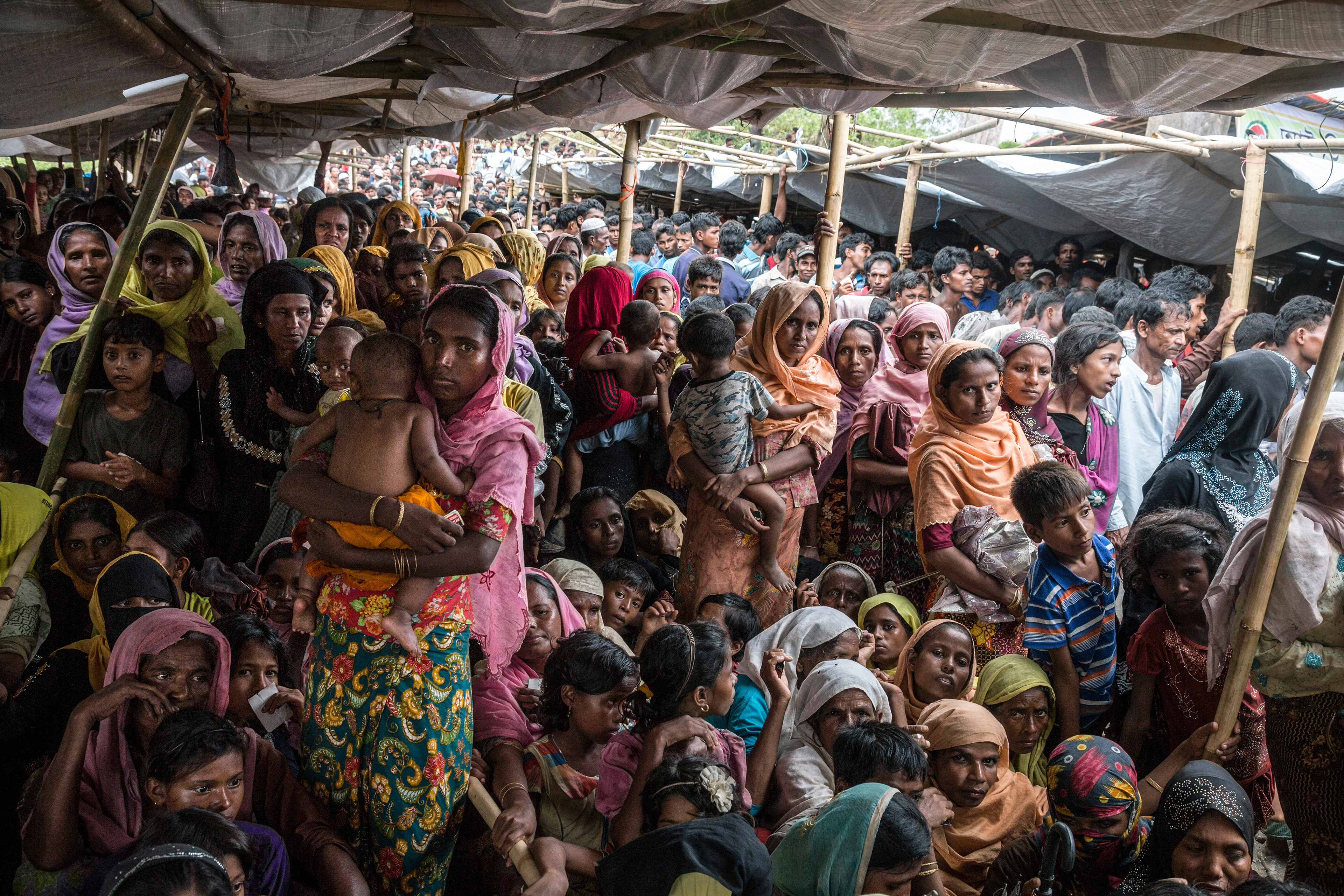 Newly arrived Rohingya refugees wait to be admitted to Balukhali Camp. Bangladesh, 2017