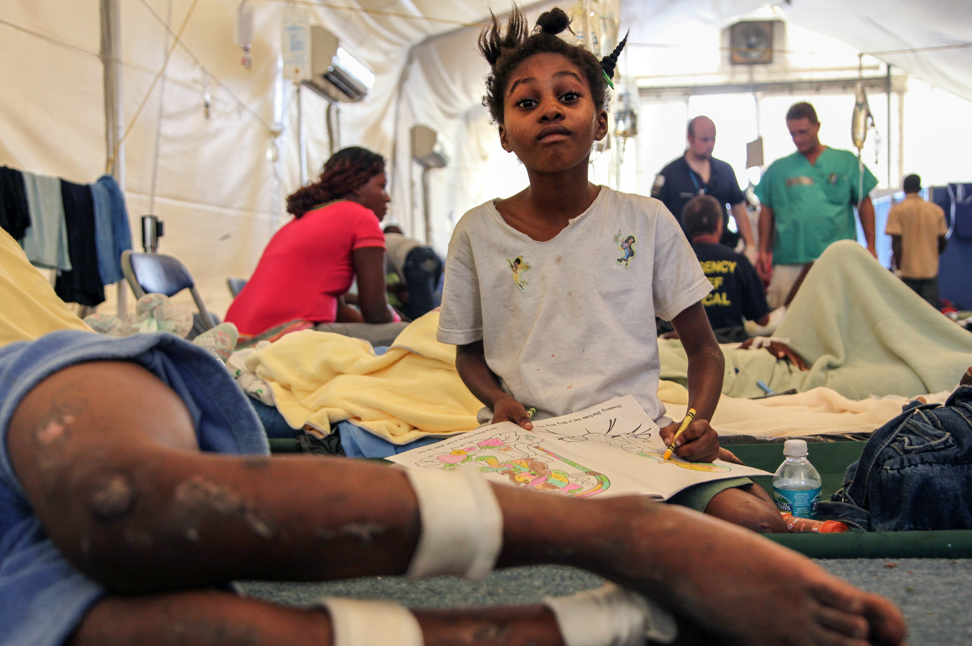 Children are treated in a filed hospital a few days after the earthquake. Port-au-Prince January 2010