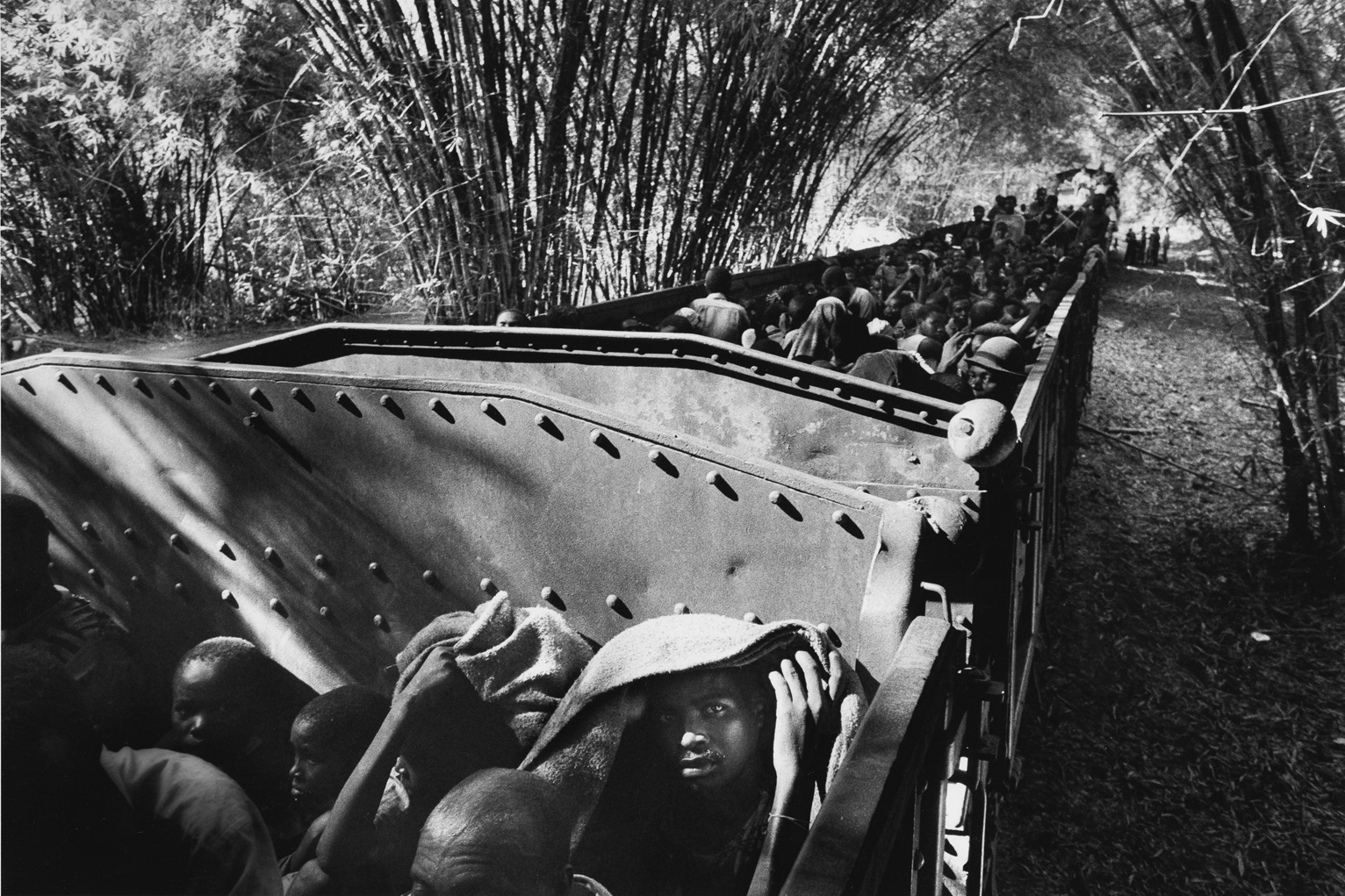 Hutu refugees are moved by train to Kisnagani, in an effort to repatriate them. D.R.Congo, 1997