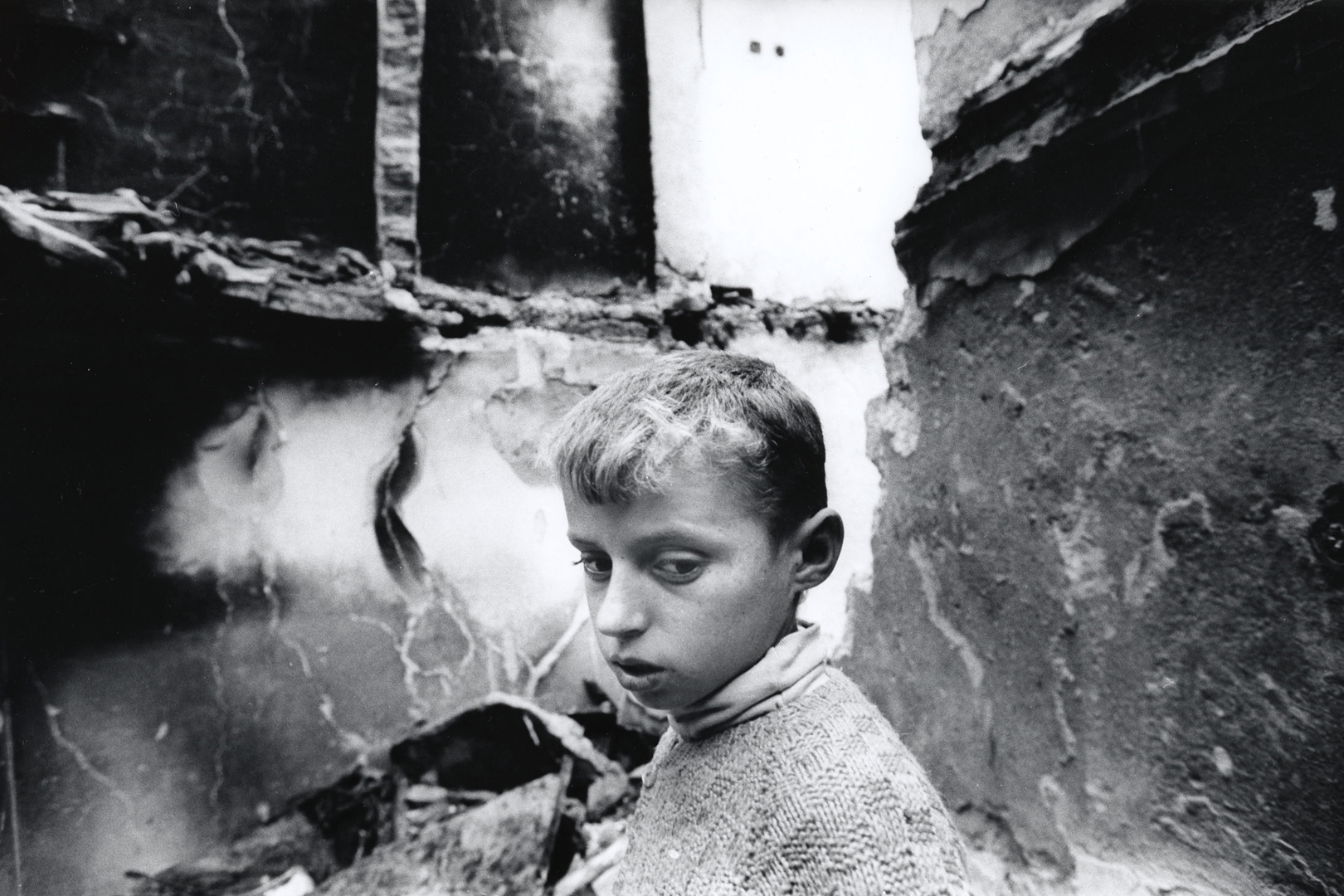 Returning to the ruins of his home, Kosovo, 10/1998