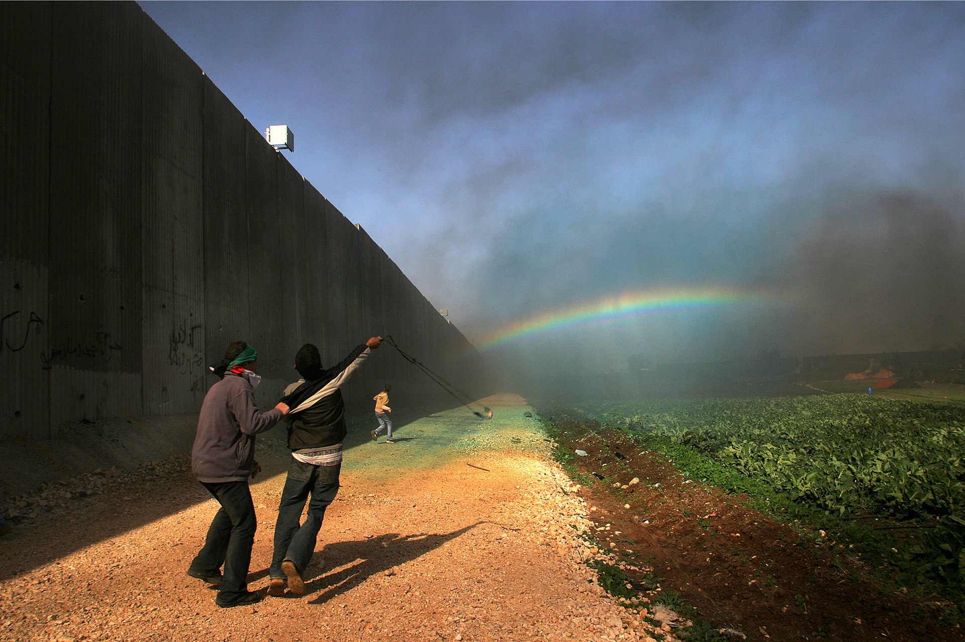 Palestinians protest the Separation Wall, December 2003
