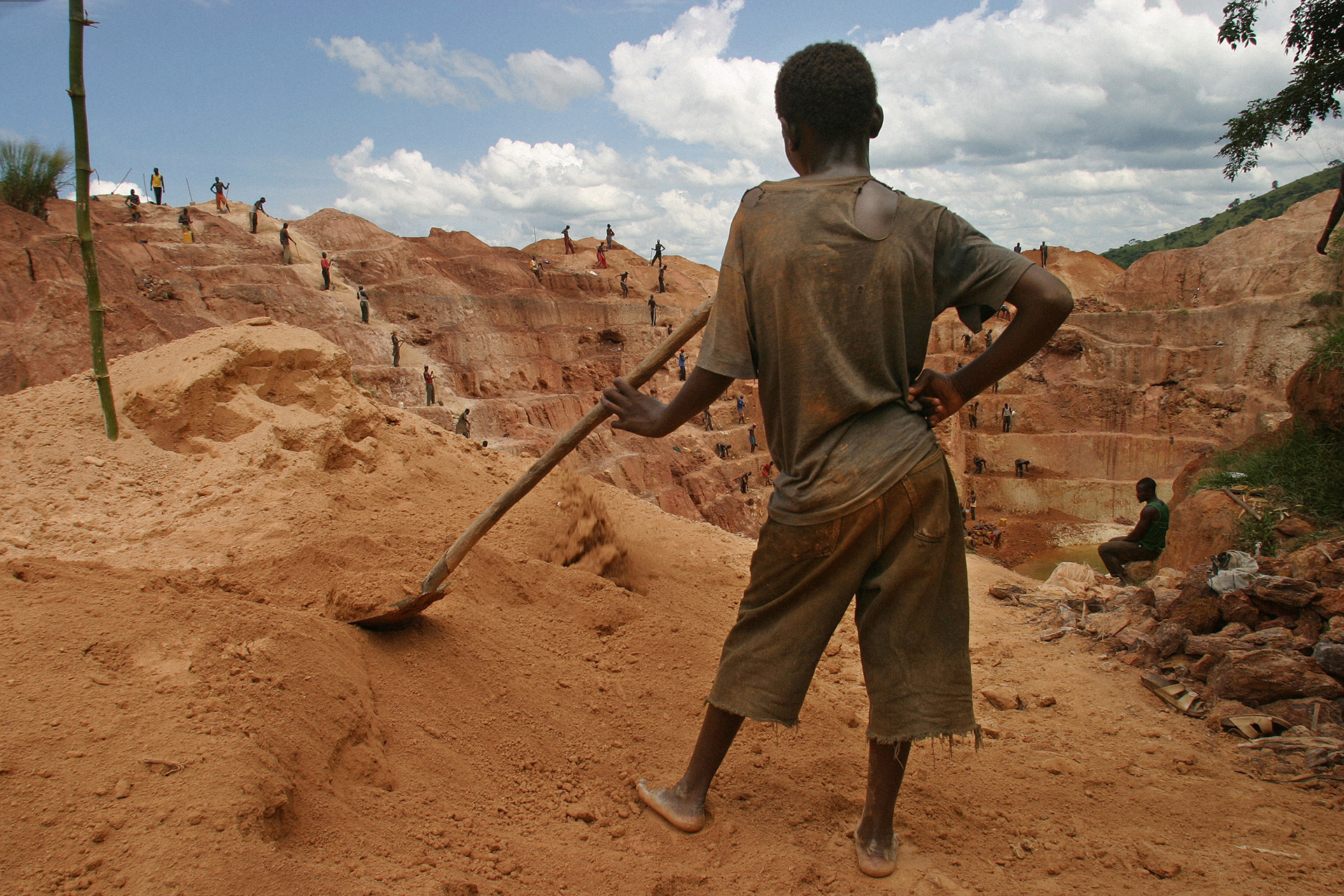 A boy working in an informal gold mine in D.R.Congo, 2004