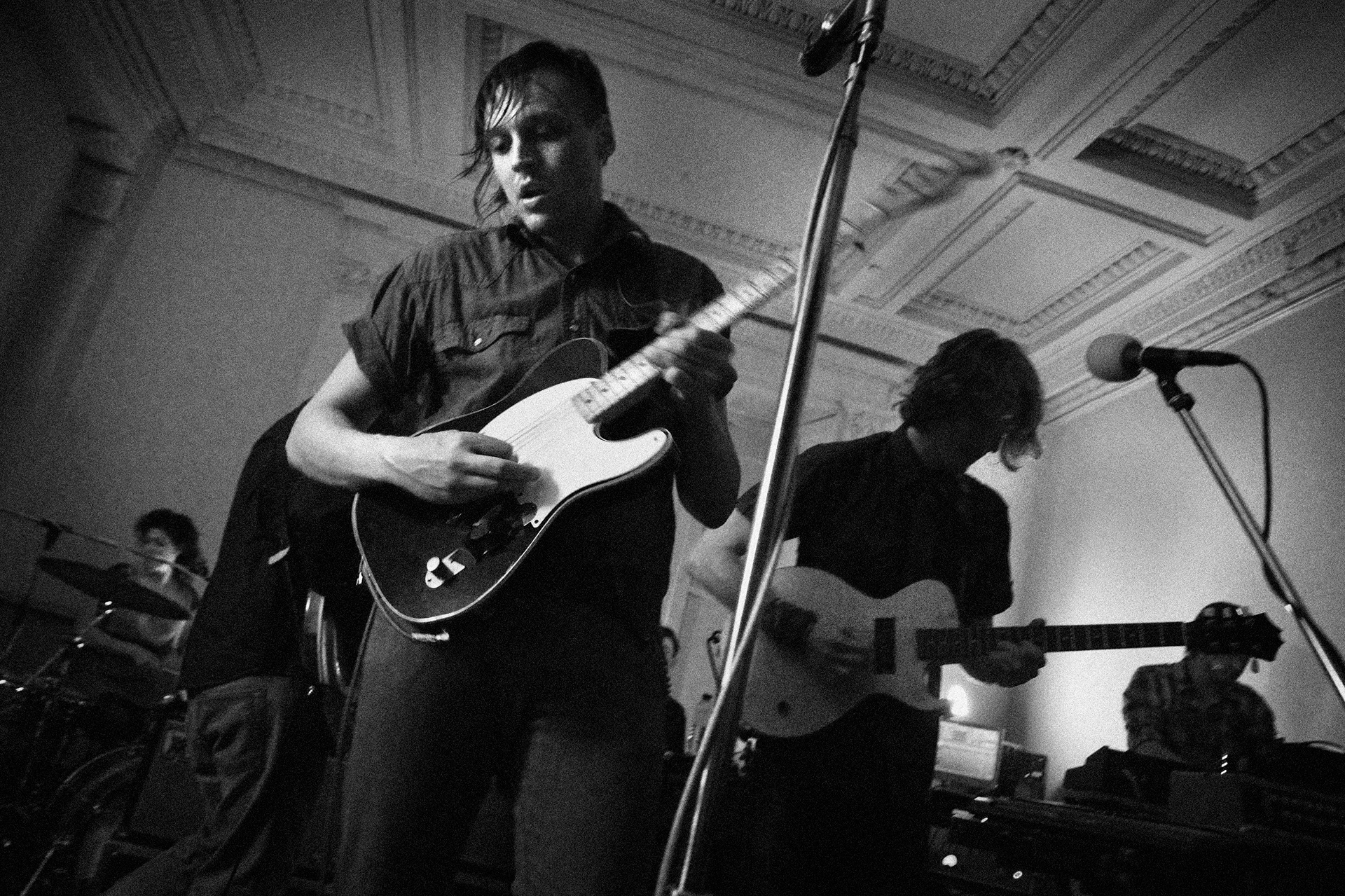 Arcade Fire performing material from "the Suburbs" in a secret location for a "test" audience. 