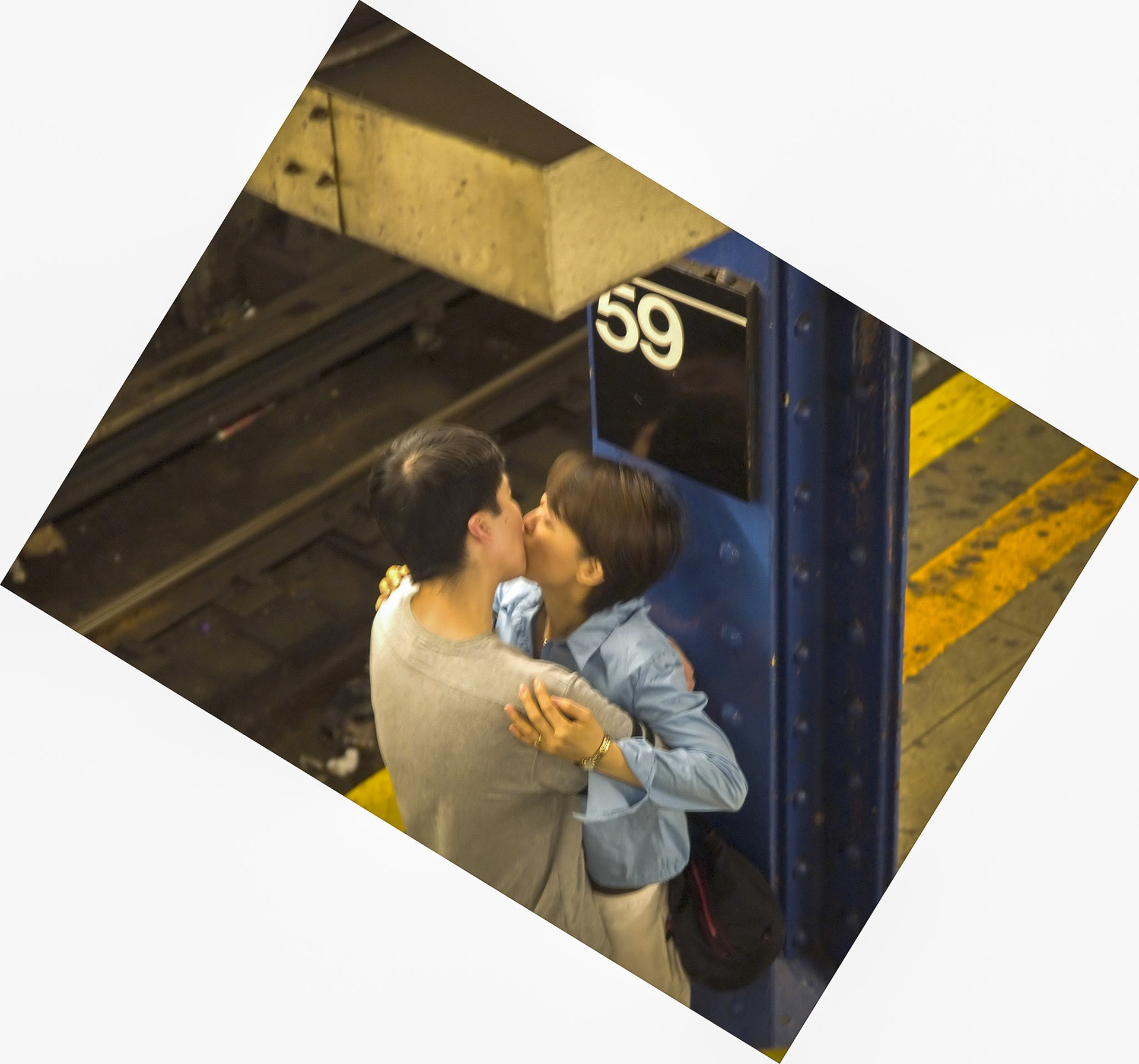 Sweet kisses at the 59 Street–Columbus Circle station, New York City, May 2004.