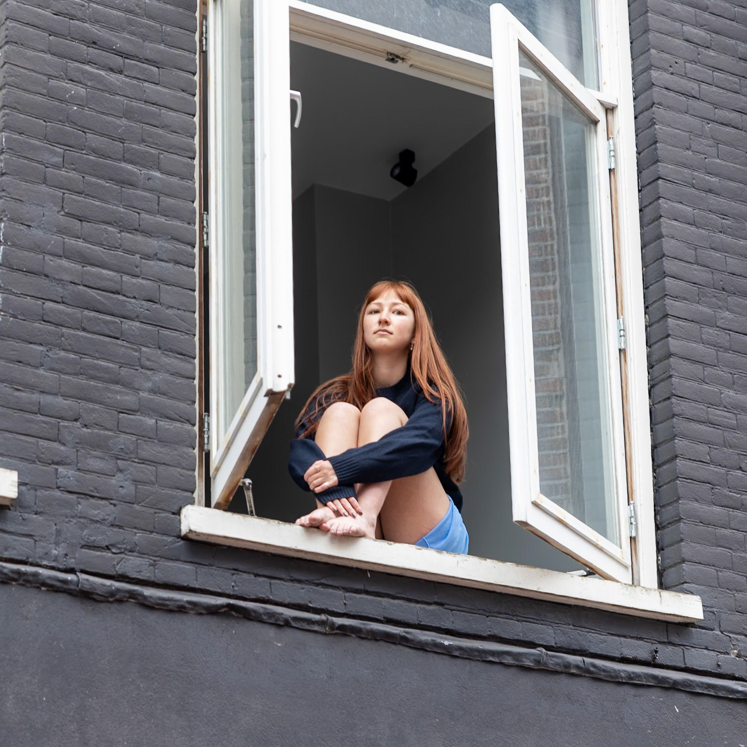 Toeschouwer bij landelijke demonstratie tegen racisme en fascisme, Amsterdam, 22.03.2025