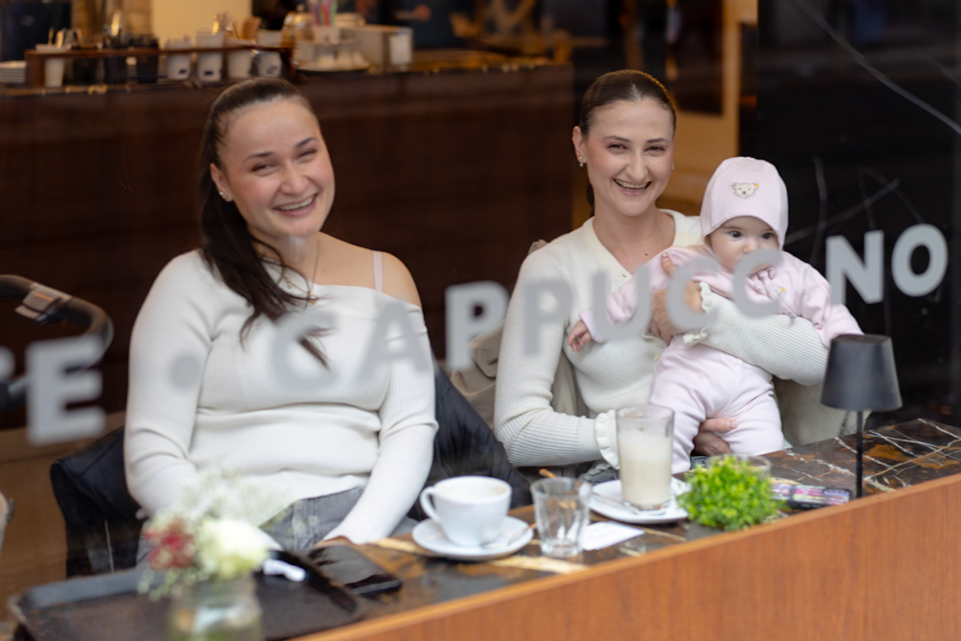 Sisters havin' cappuccino, Berlin, February 2026.