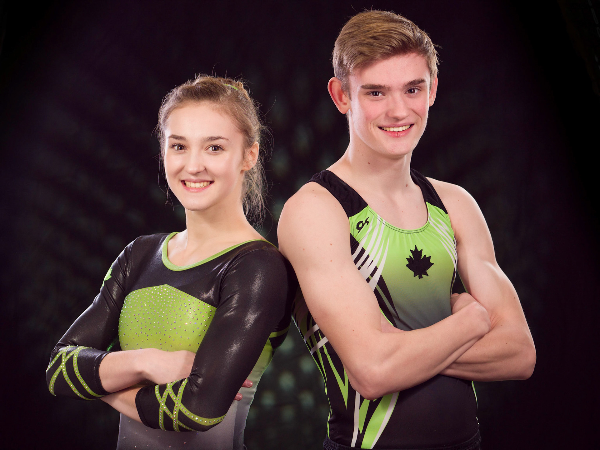 Brother and sister gymnasts in the studio for a fun session.