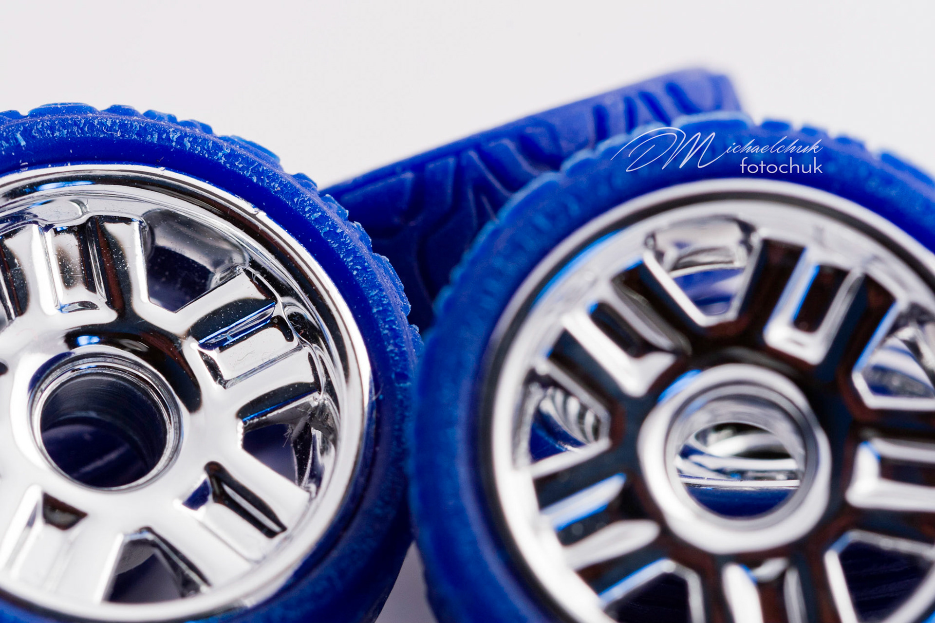 This was my first shoot with a real macro lens.  It was inspired and composed for the “from every angle” monthly project at photoblogchallenges.com.  The subject in this series, Automoblox truck and hot rod , has got to be one of the coolest toys ever.  I would almost have to say its right up there with Lego.  My son will play with just these two vehicles for hours.The shoot itself was very interesting.  I had a real challenge getting the lighting and background just right.  Over the course of an evening, I ended up building my own light box out of a beer case, white paper and scotch tape and a 2000watt halogen.  It worked surprisingly well.